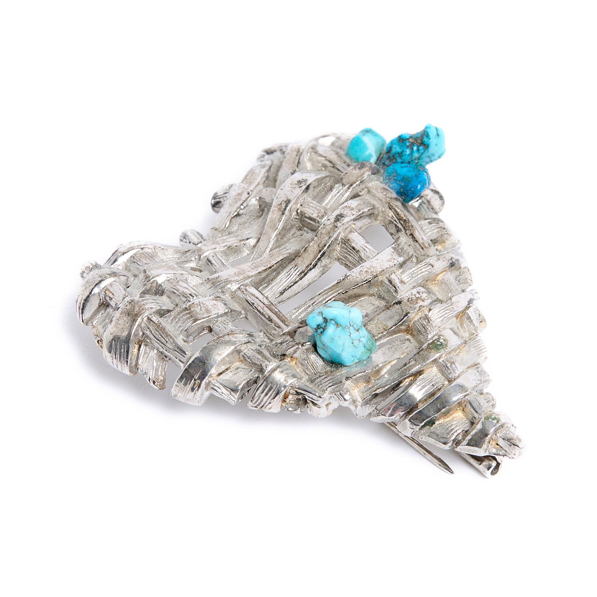 Christian Lacroix Haute Couture brooch in the shape of a large heart in slightly aged silver metal (a little darker than in the photo) braided and inlaid with nuggets of turquoise (or turquoise-style resin)... Dated 