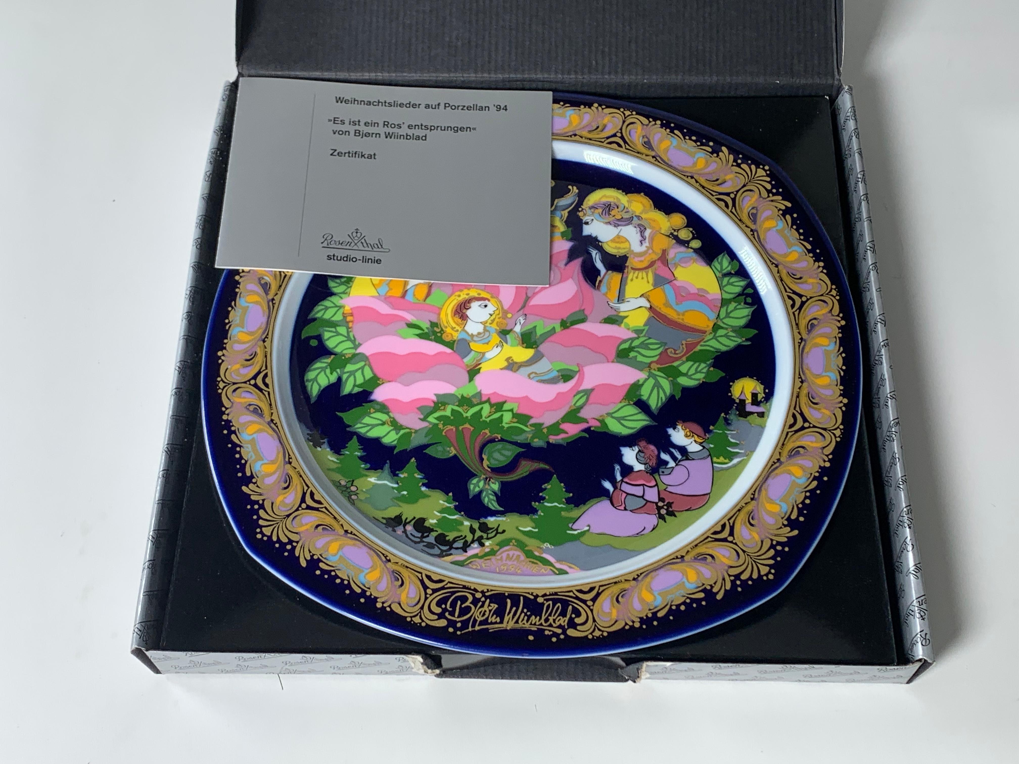 Porcelain Christmas plate from 1994 by Bjorn Wiinblad made by the German manufacturer Rosenthal. The dish is titled “Lo How A Rose E'er Blooming”. When Rosenthal asked the Danish artist to illustrate a new series of dishes, he decided to choose the