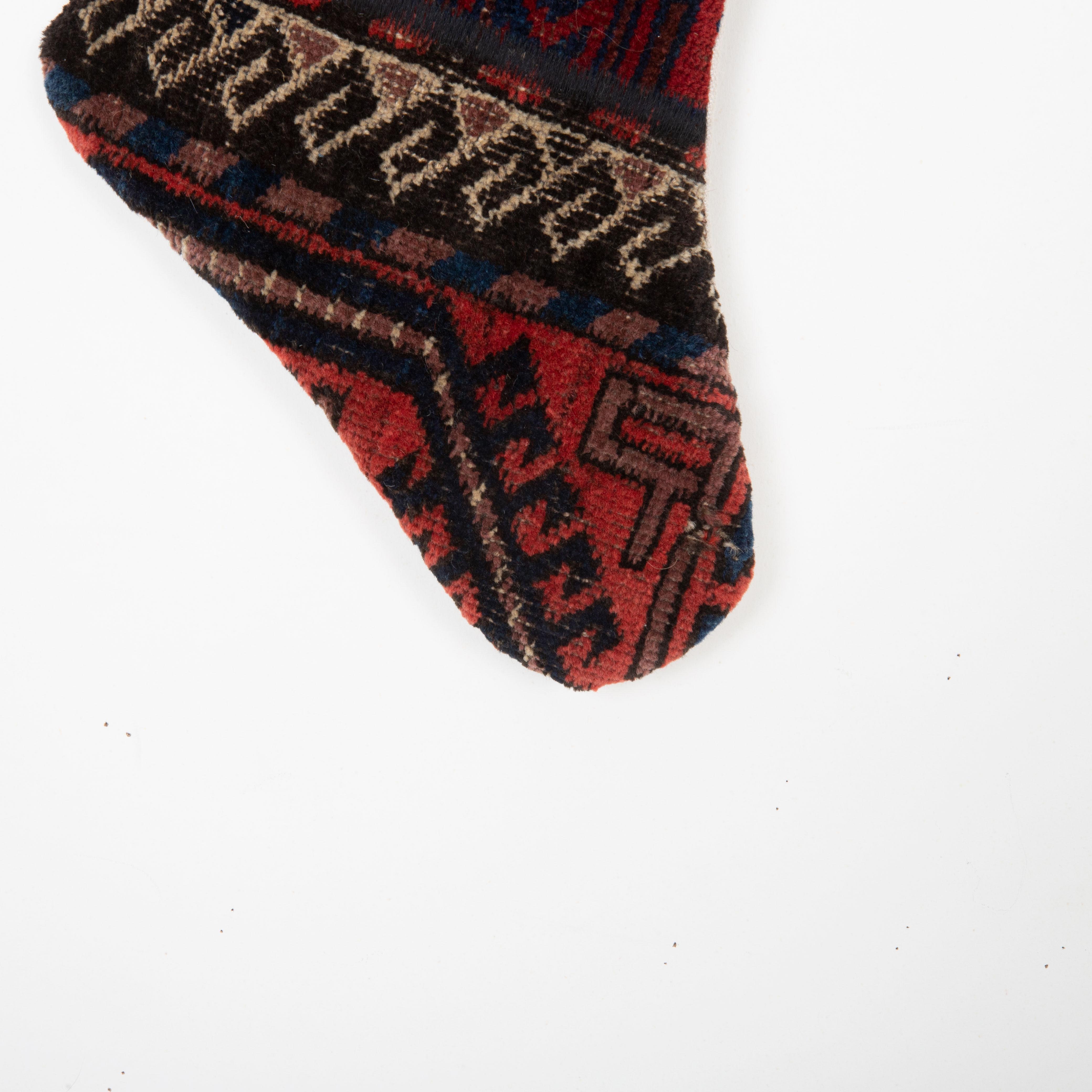 Tribal Christmas Stocking Made from Baluch Rug Fragments For Sale