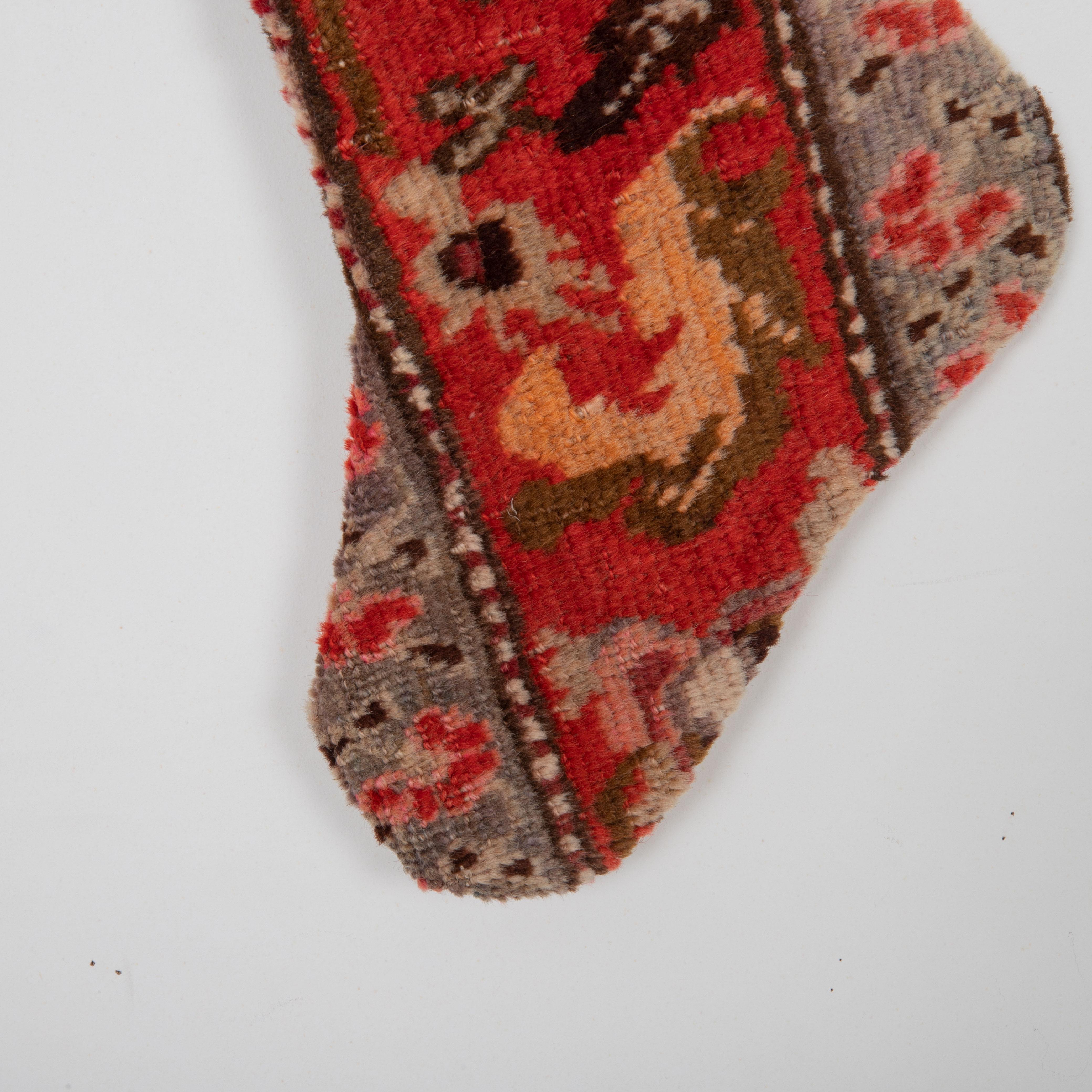 Hand-Knotted Christmas Stocking Made from Caucasian Rug Fragments For Sale