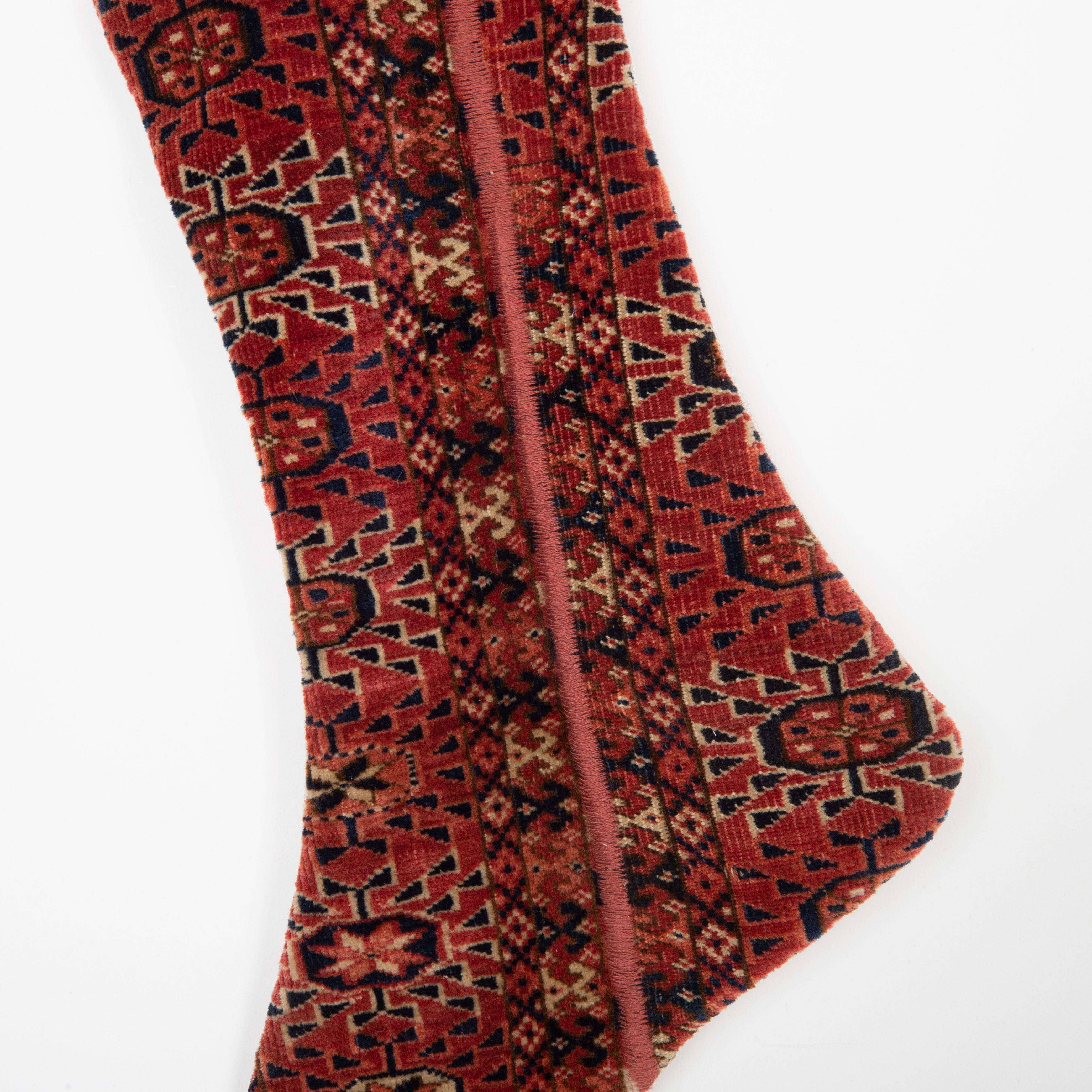 Hand-Knotted Christmas Stocking Made from Turkmrn Rug Fragments For Sale