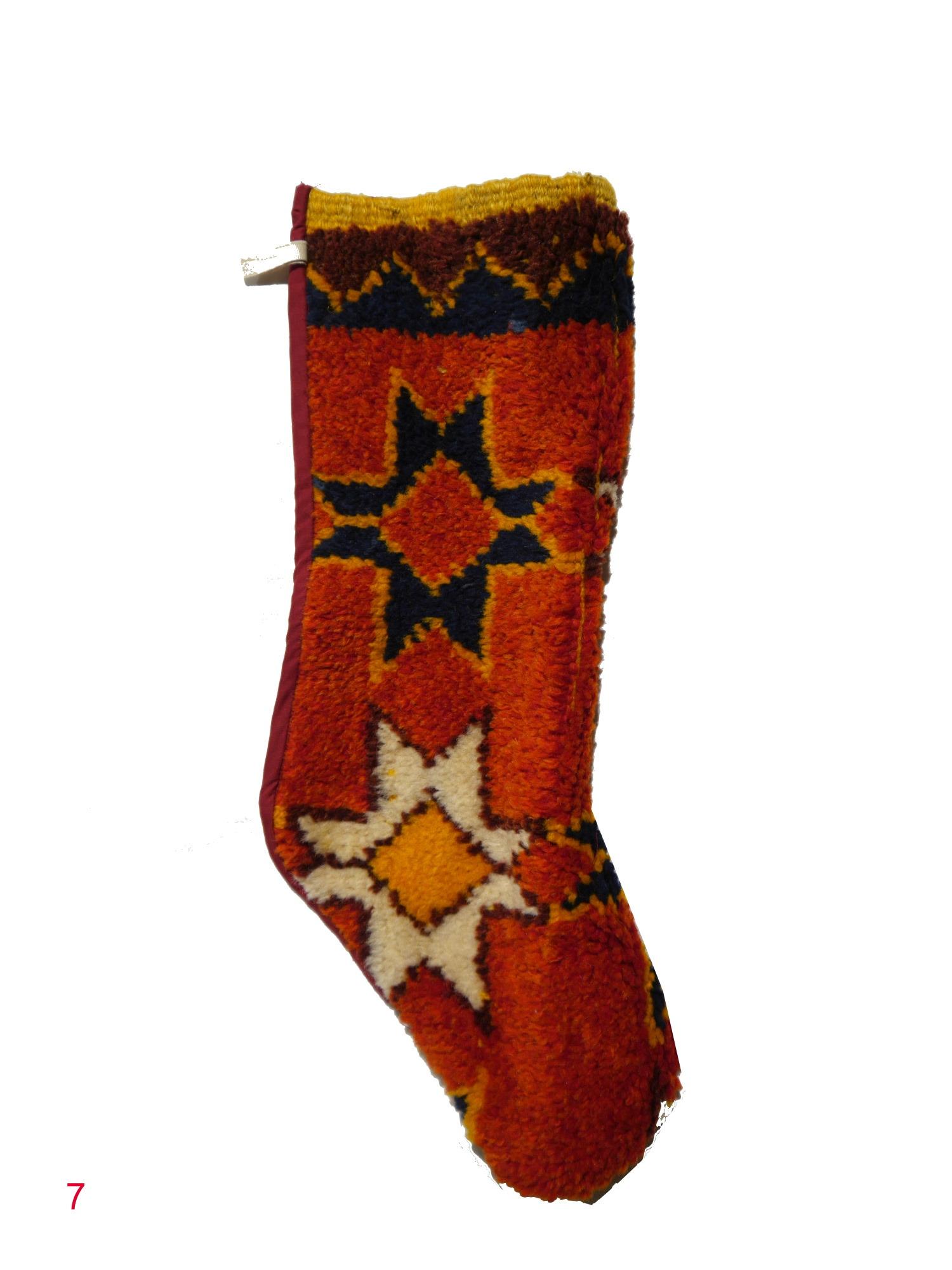 One of a kind Christmas stockings.
These Christmas stocking were made using a vintage Moroccan Berber rug. The front is 100% pure luxurious hand-spun wool, the backing is cotton. Some of the stockings have orange backing, some have burgundy