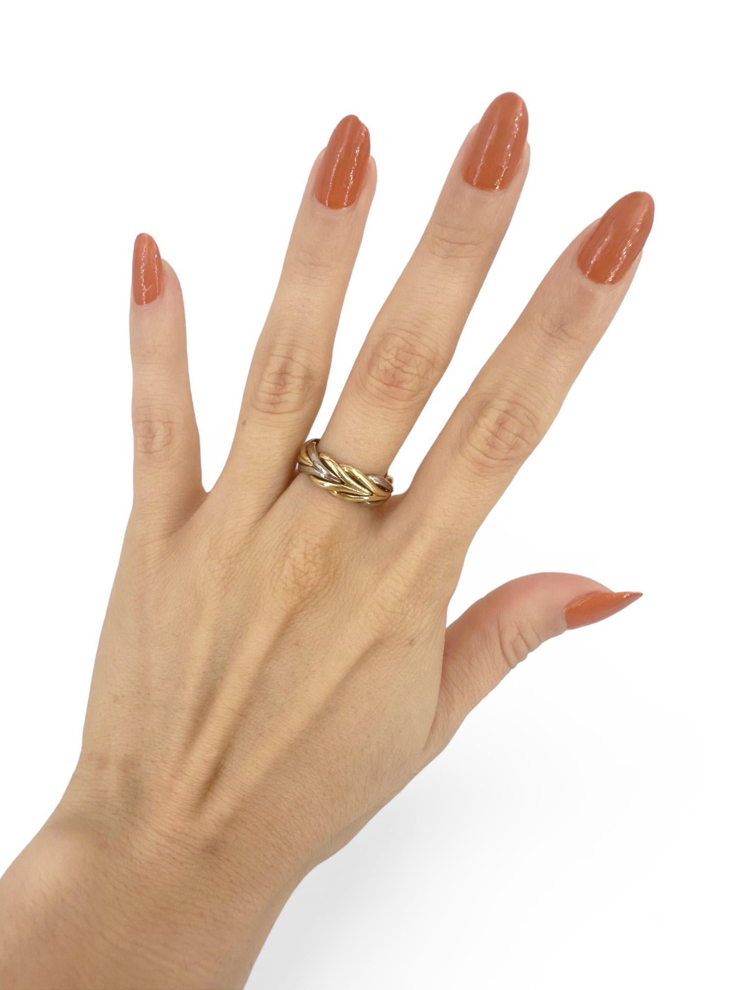 Voici l'exquise bague en or bicolore 18kt de Christofle, une pièce étonnante qui incarne l'élégance et la sophistication. Cette bague magnifiquement travaillée présente un mélange harmonieux d'or jaune et d'or blanc, créant un contraste saisissant
