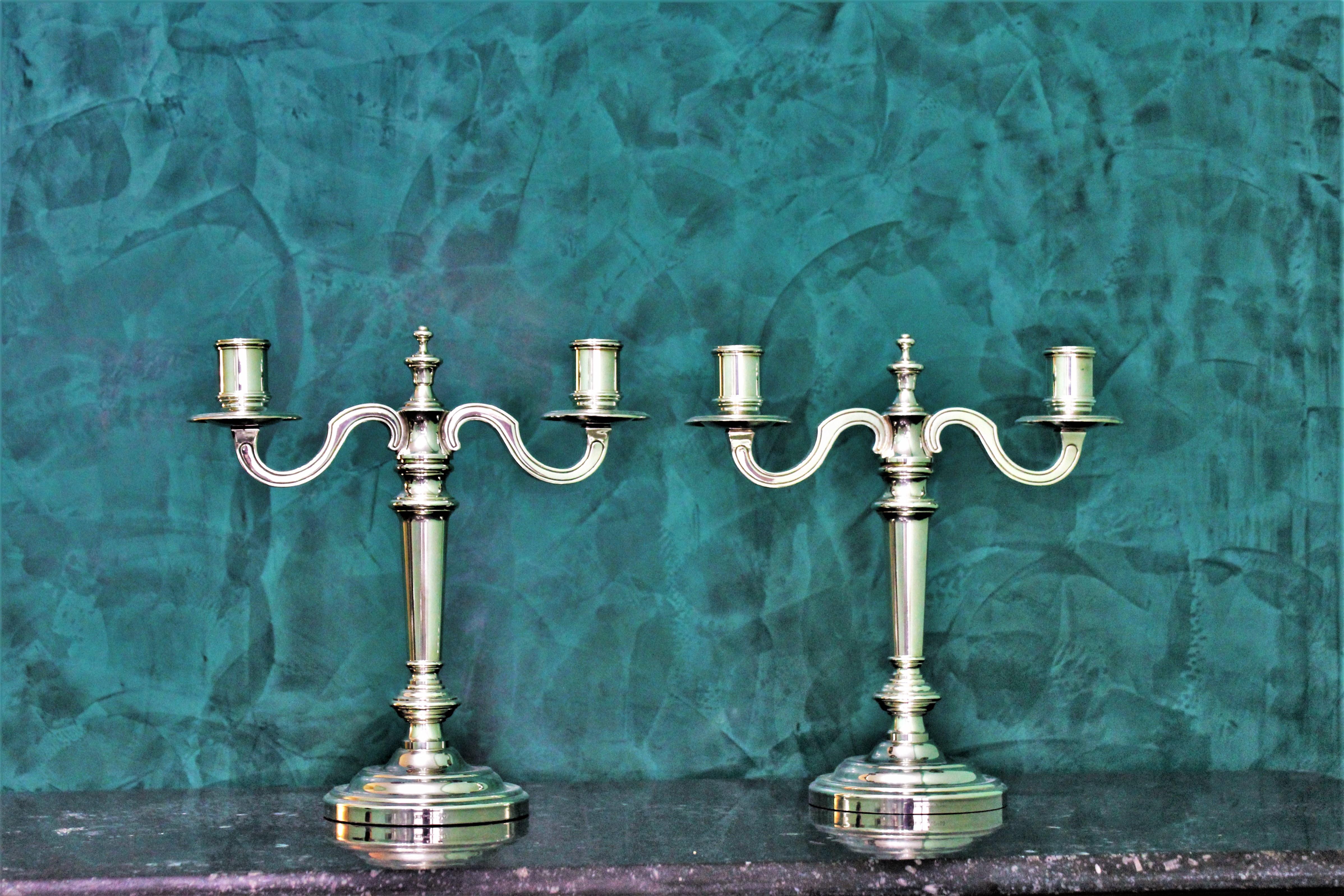 Pair of Christofle candlesticks, realized by the French Maison located in Paris with the typical Christofle alloy.
Beautiful, elegant and in very good condition.
Dimensions: Height 26.5 cm, width 25.5 cm, depth 10.5 cm, weight 2638 gr.