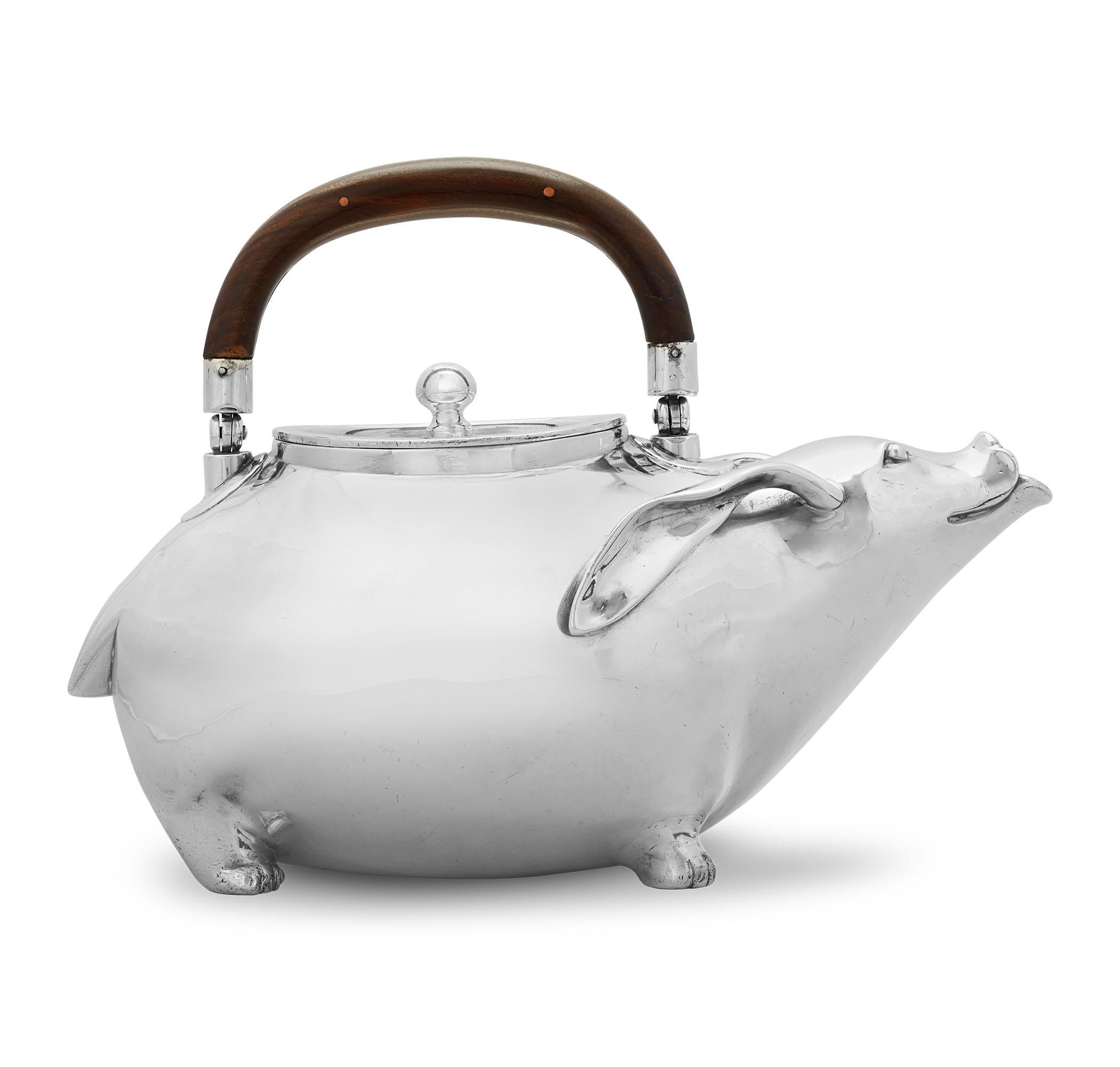 Beautifully crafted and endlessly charming, this exceptionally rare silverplate teapot by the prestigious firm of Christofle & Cie. takes the form of a stylized wild hare. It was designed by Emile Reiber, a highly regarded architect, designer and