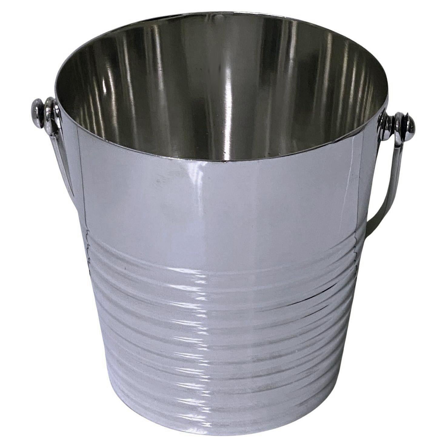 Christofle Art Deco Luc Lanel Ondulations Silver Plate small Wine Bucket, C.1935 Very slightly tapered form, plain with ribbed band surround, swing reeded handle, conforming in design. Marked with Christofle Marks on baseand number 18. Height: 5.25