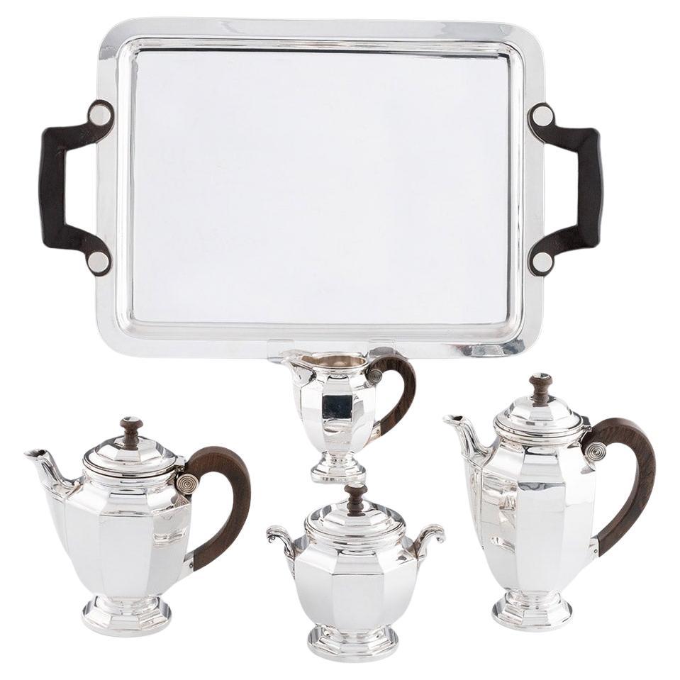 Heading : Christofle Art Deco tea set
Date : The scale mark to the base dates this to after 1935
Origin : France
Decoration : Each piece shouldered and panelled with terraced feet.
Size : Tallest 14cm, tray 55x33cm
Condition : Excellent, minor wear