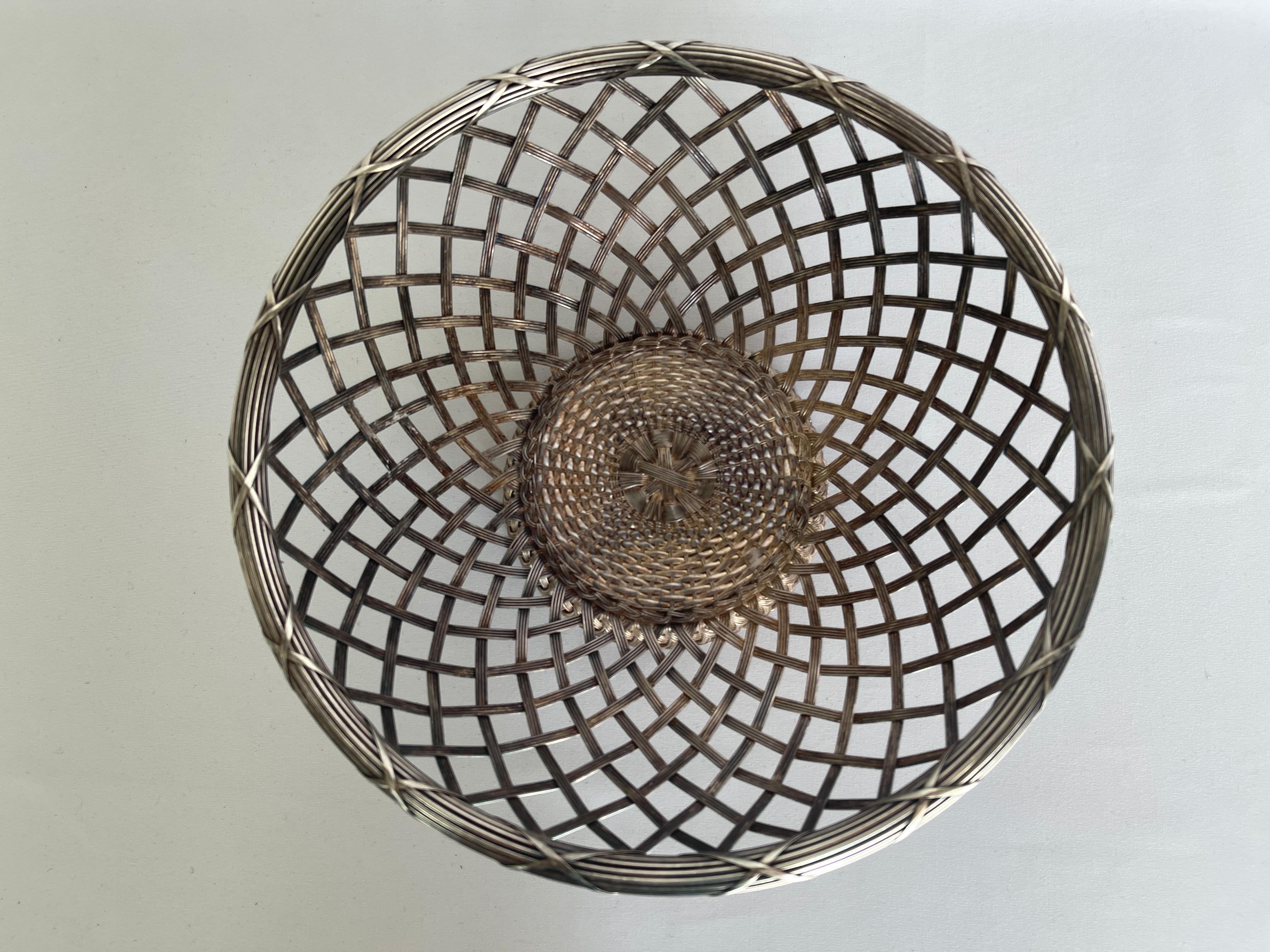 Christofle attributed hand woven silver plate metal woven basket, circa mid 20th century. Signed with stamped metal label on bottom, Made In France.
 