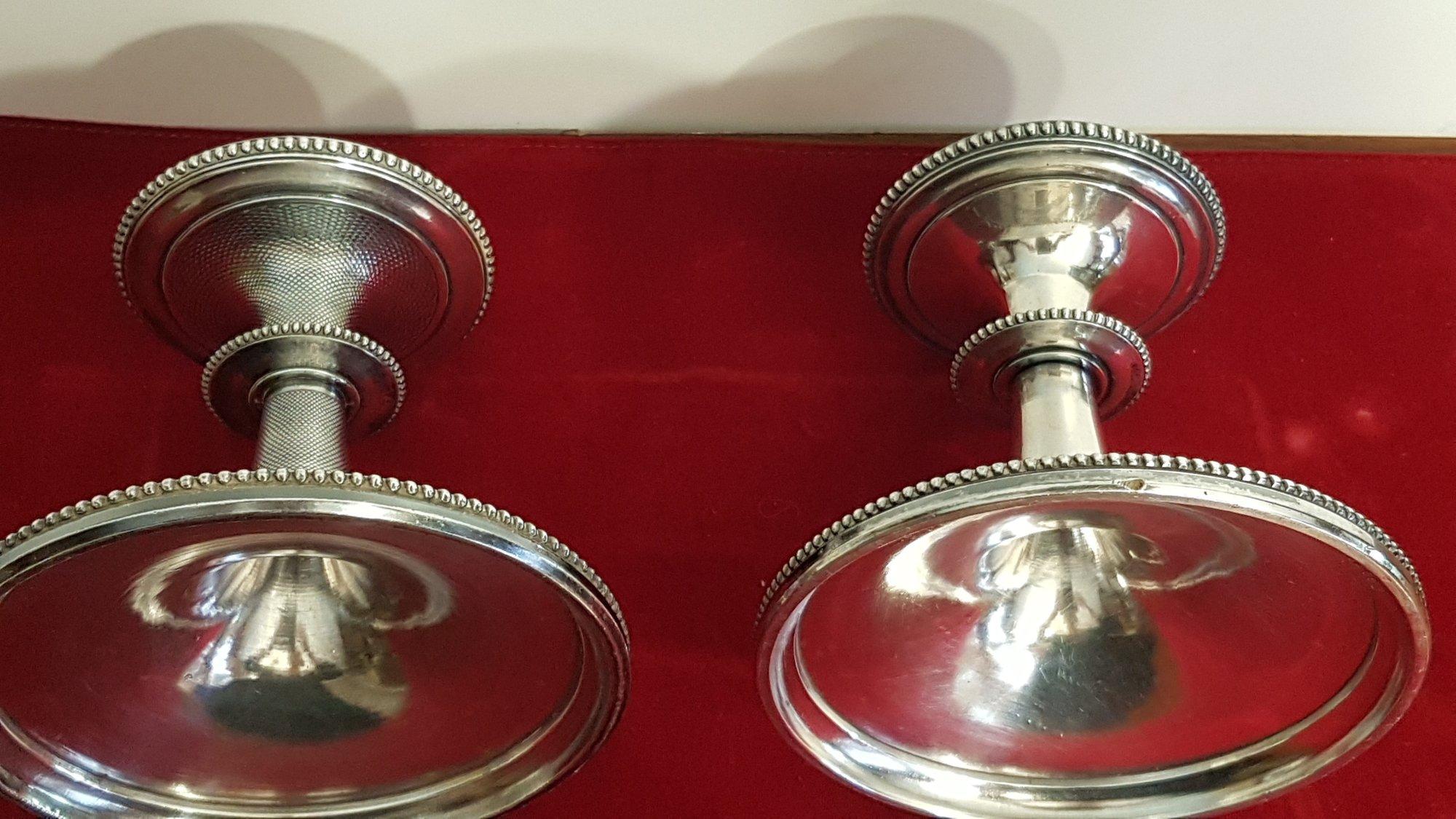 These rare Christofle Art Deco Candlestick holders from the 1950s are stunning vintage pieces that will make a wonderful addition to any collection. Each candle holder stands at 13 cm tall and is beautifully crafted from silver plate, reflecting the