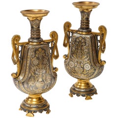 Christofle & Cie, a Pair of French Gilt and Silvered Bronze "Persian" Vases