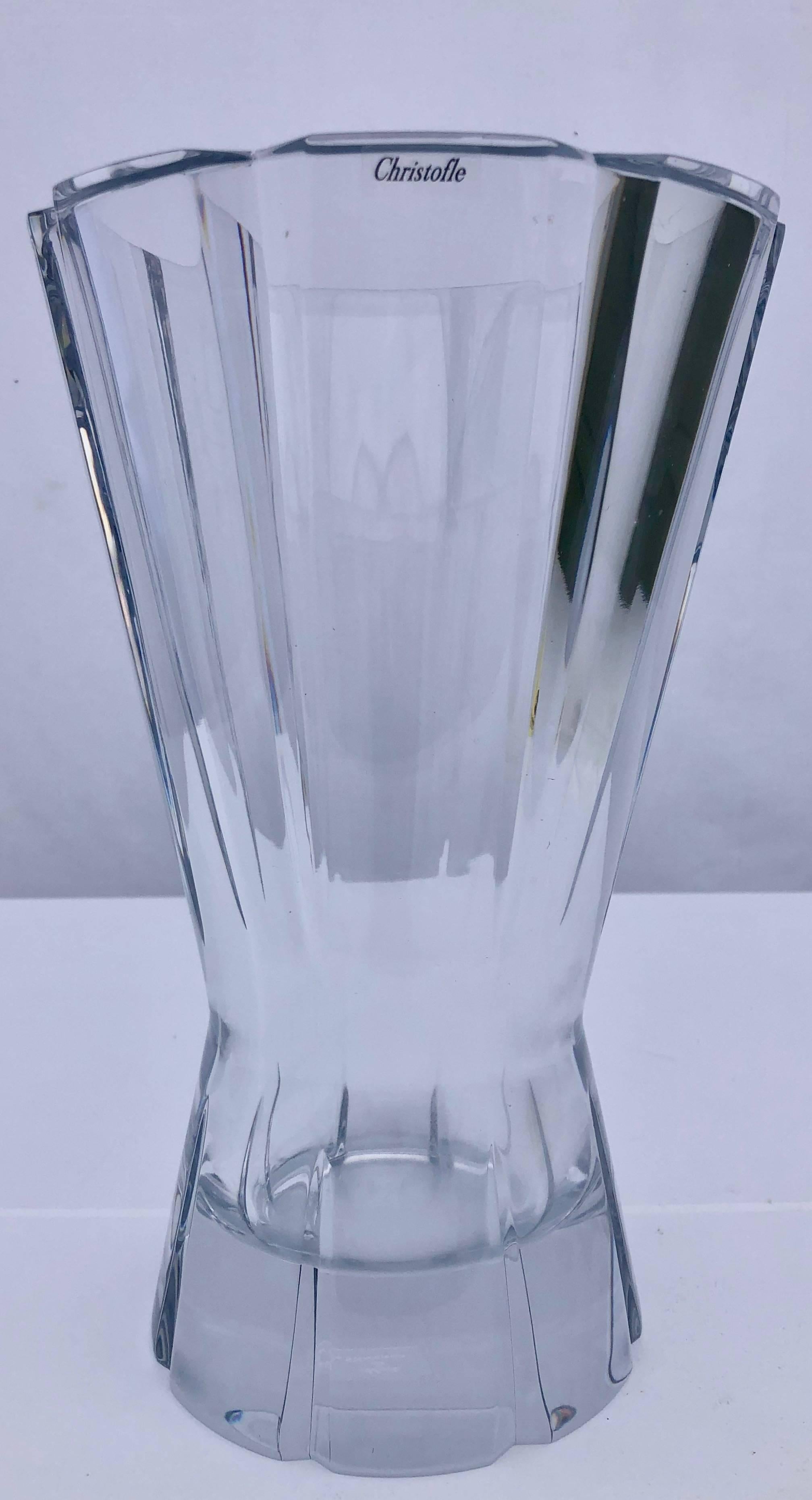 This is a gorgeous Christofle cut crystal vase that is new, never used. The model is called Djambe. This model was only produced for several years in the 1990s. It is very rare to see one brand new, never used. It a very substantial piece that is