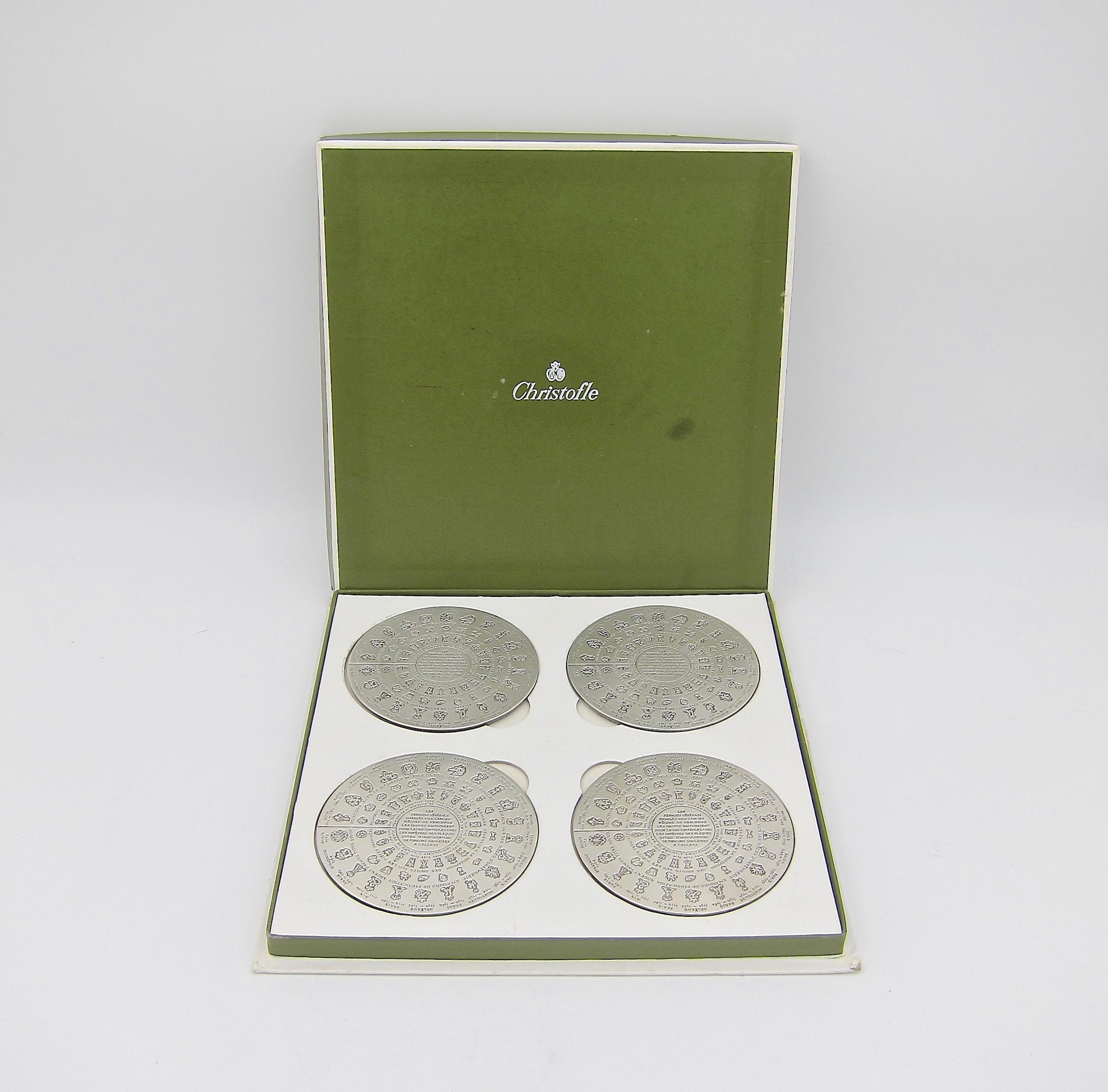 A Christofle of Paris set of 4 vintage coasters commemorating the Farmers Généraux, a 17th and 18th century tax collecting organization charged with collecting duties on behalf of the King of France. The marks on these pieces are copies of the
