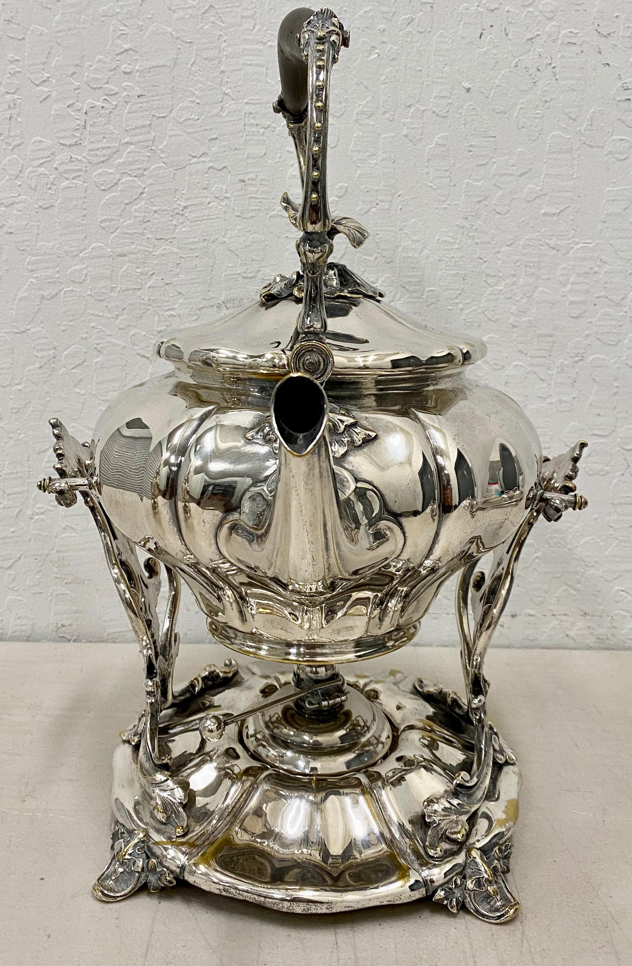 Antique Christofle, France silver plate tilting coffee pot on stand

19th century

Antique ornate silver plated coffee pot on stand. 

Beautiful design with engraved floral decoration.

Comes with original stand, burner and lid.

Complete