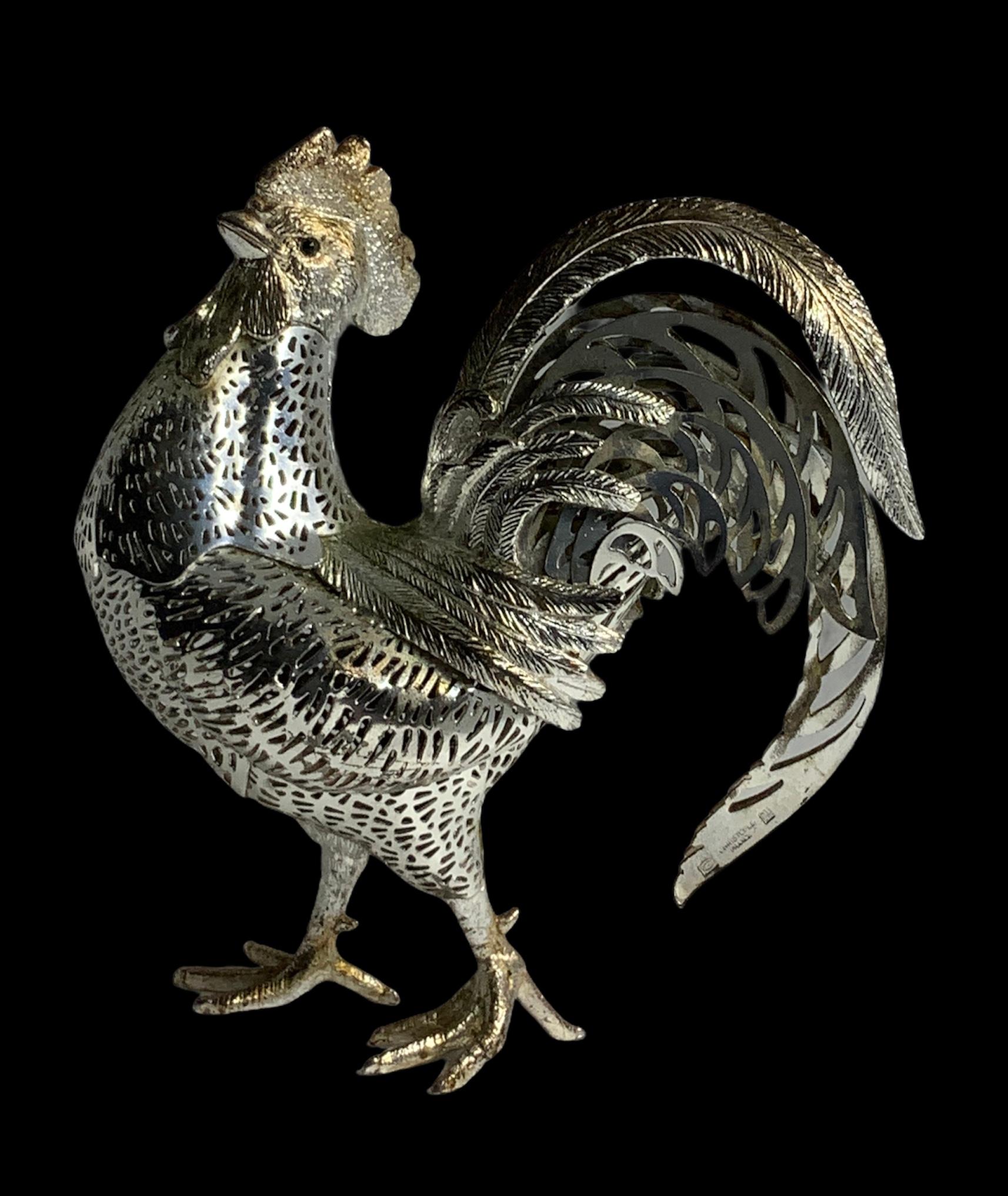 This is a pierced silver plated Christofle Lumiere D’Argent collection small proud rooster sculpture/figurine with enameled black eyes. The rooster has inscribed Christofle, France in one of the sickle feathers.