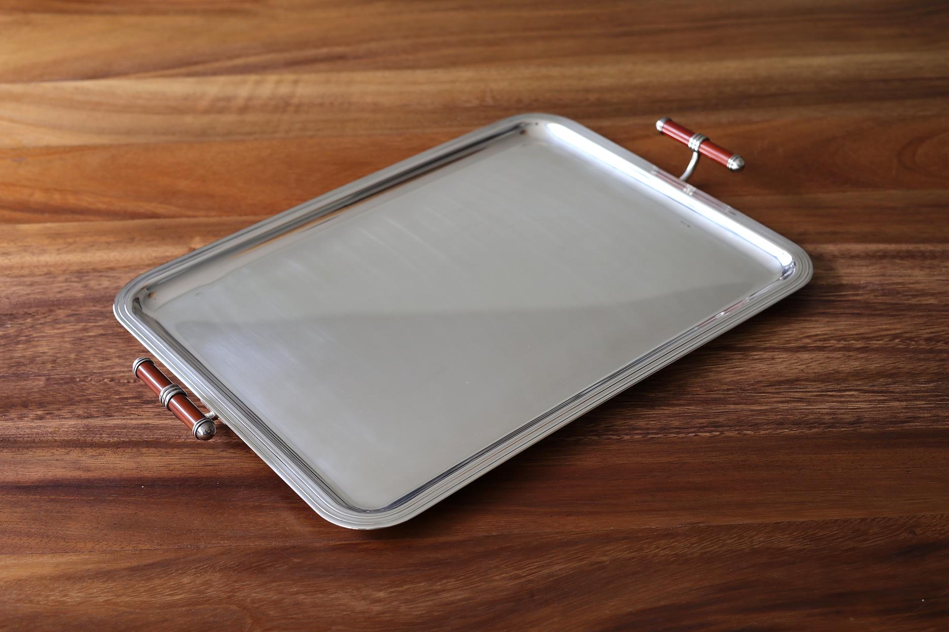 This is a high quality French Art Deco style silver plated tray by French silversmith and retailer Christofle, this collection was designed by Adam D. Tiney & Thomas Keller, circa 1998 in date. 
Signed Christofle K + T and Laque De Chine.