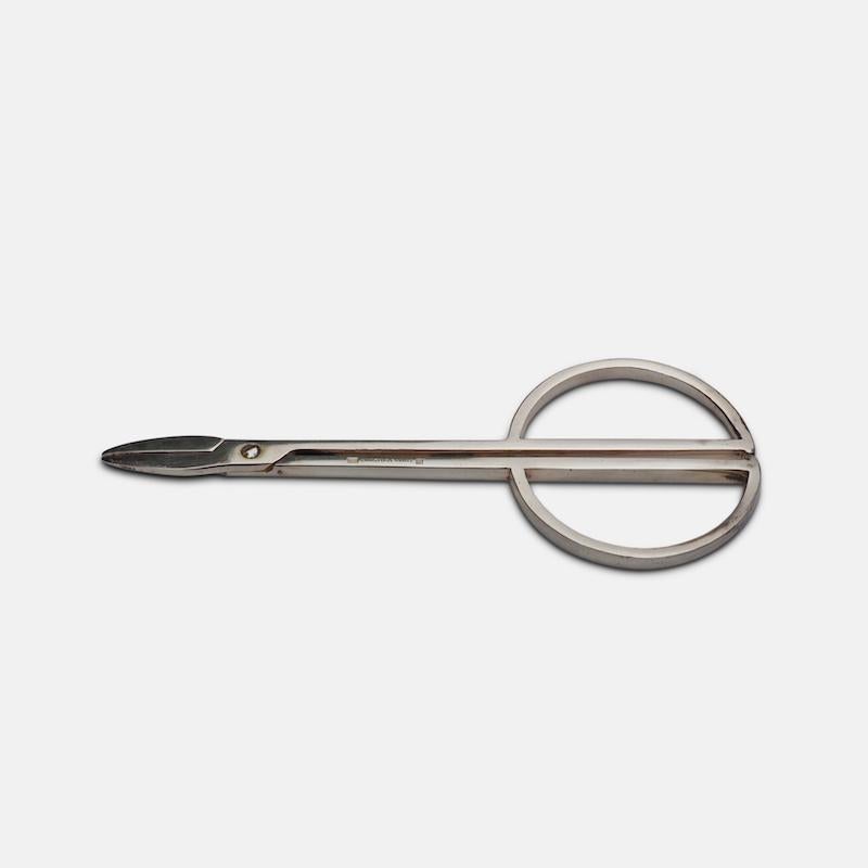 A pair of 1960s modernist grape scissors by esteemed French silver maker Christofle. Packaged in their original box and stamped, Christofle France.