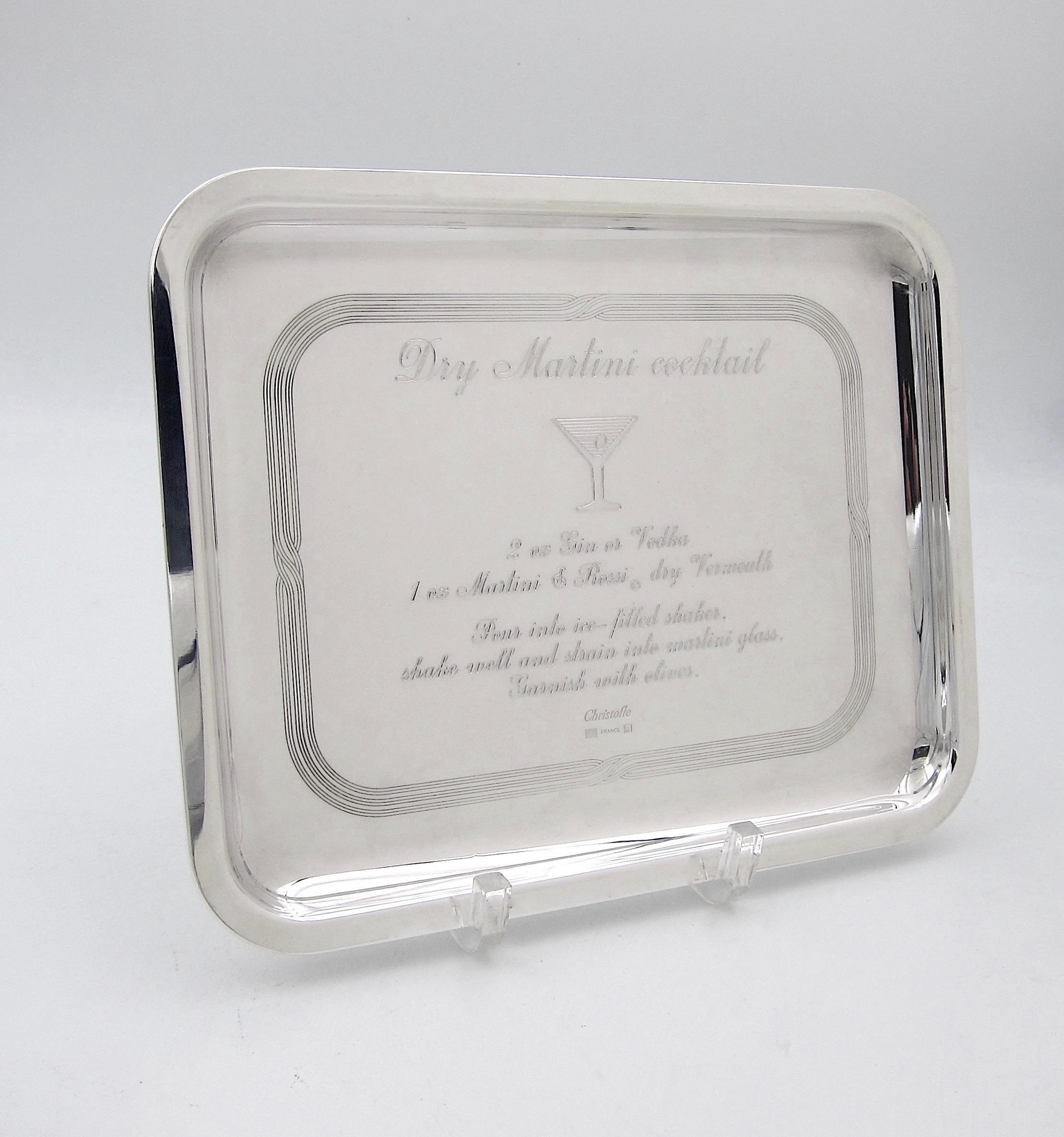 A Christofle of Paris drinks tray in silver plate, decorated with an engraved recipe for a dry martini cocktail. The sleek and elegant rectangular bar tray remains in good condition with a few scuffs and scratches, particularly on the base. Fully
