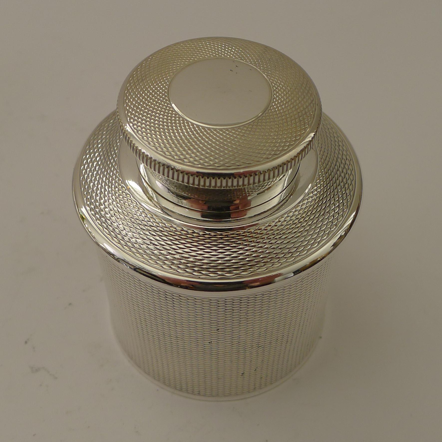 A rarely found French silver plated tea caddy or cannister dating to c.1940 / 1950.

Beautifully decorated with engine turning and fully marked on the underside by Maison, Christofle or Paris.

Excellent condition measuring 2 3/8