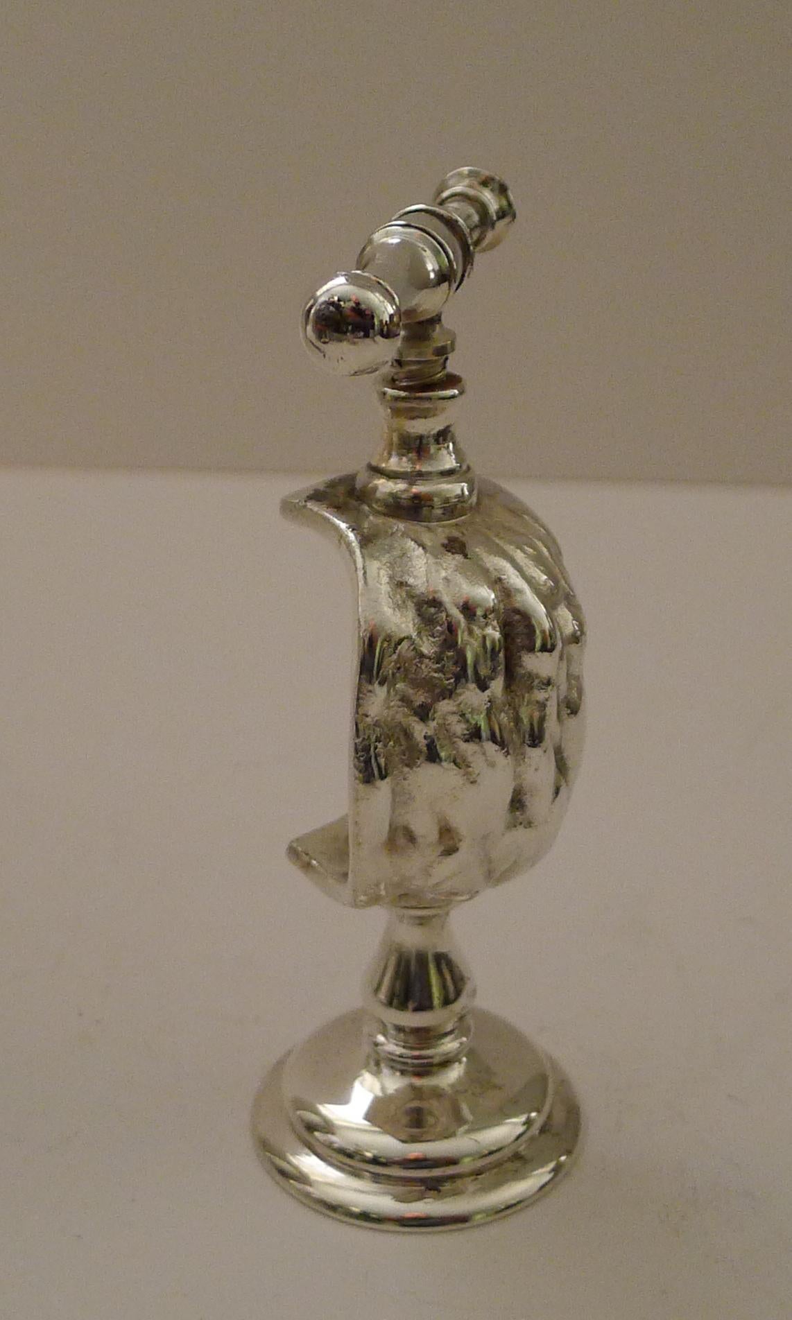 A fabulous novelty cast and silver plated nutcracker in the form of a Walnut.

Lovely quality, to be expected from the world renowned Maison Christofle, fully marked and signed on the underside.

Dating to c.1920, it remains in excellent condition