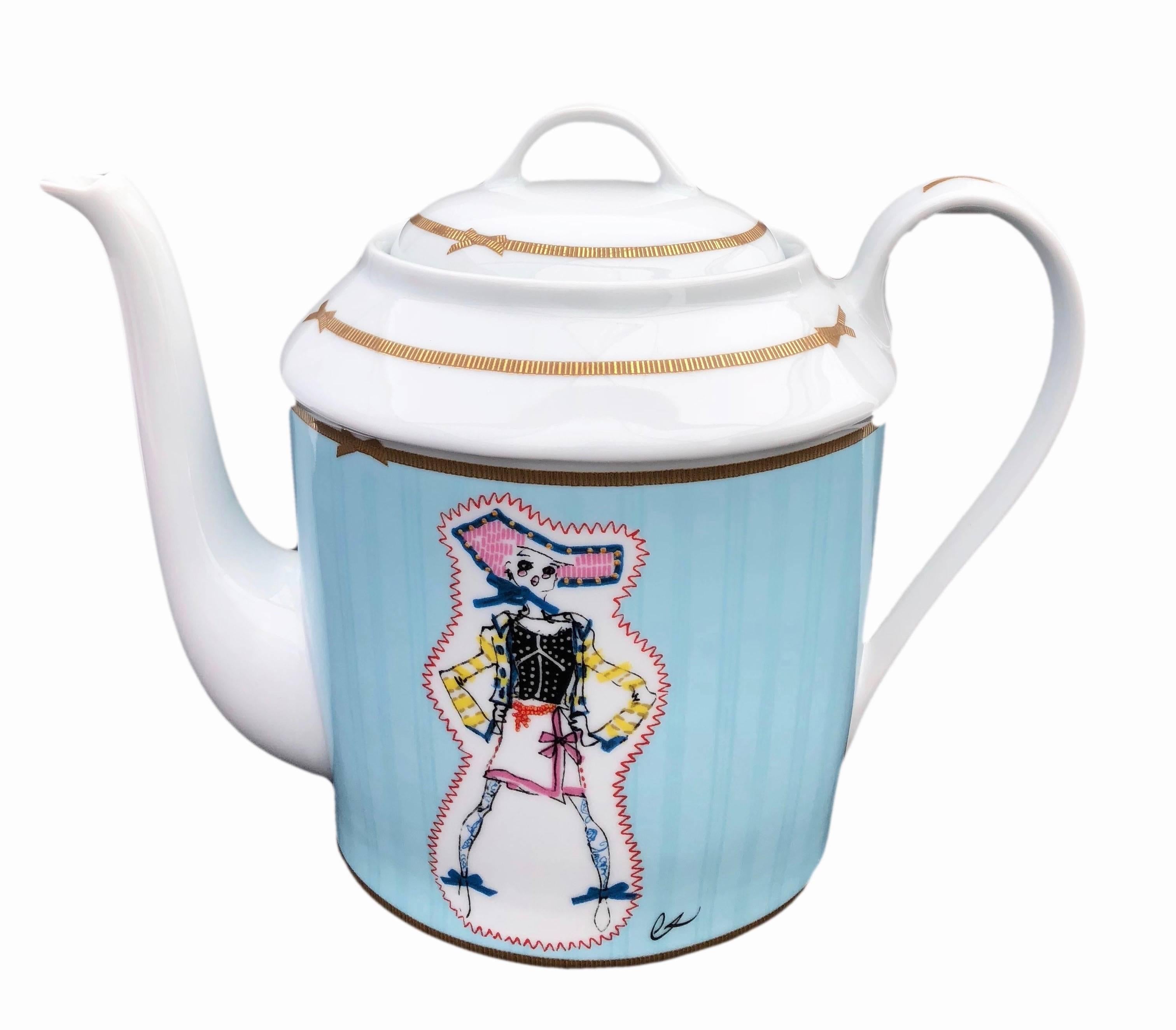 This rare tea-coffee pot has never been used and comes in its original box with its label. It is the Christian Lacroix 