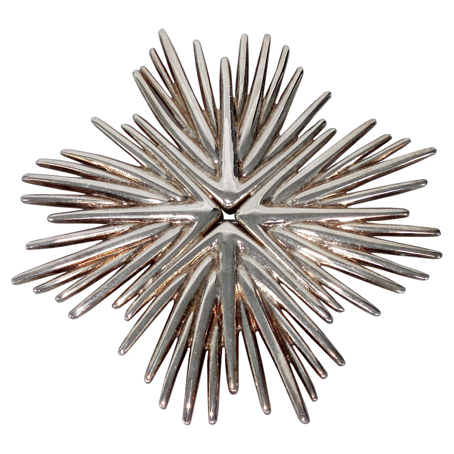 Ciondolo a spilla in argento Christofle Serie Palmaceae, disegnato da Michele Oka Doner