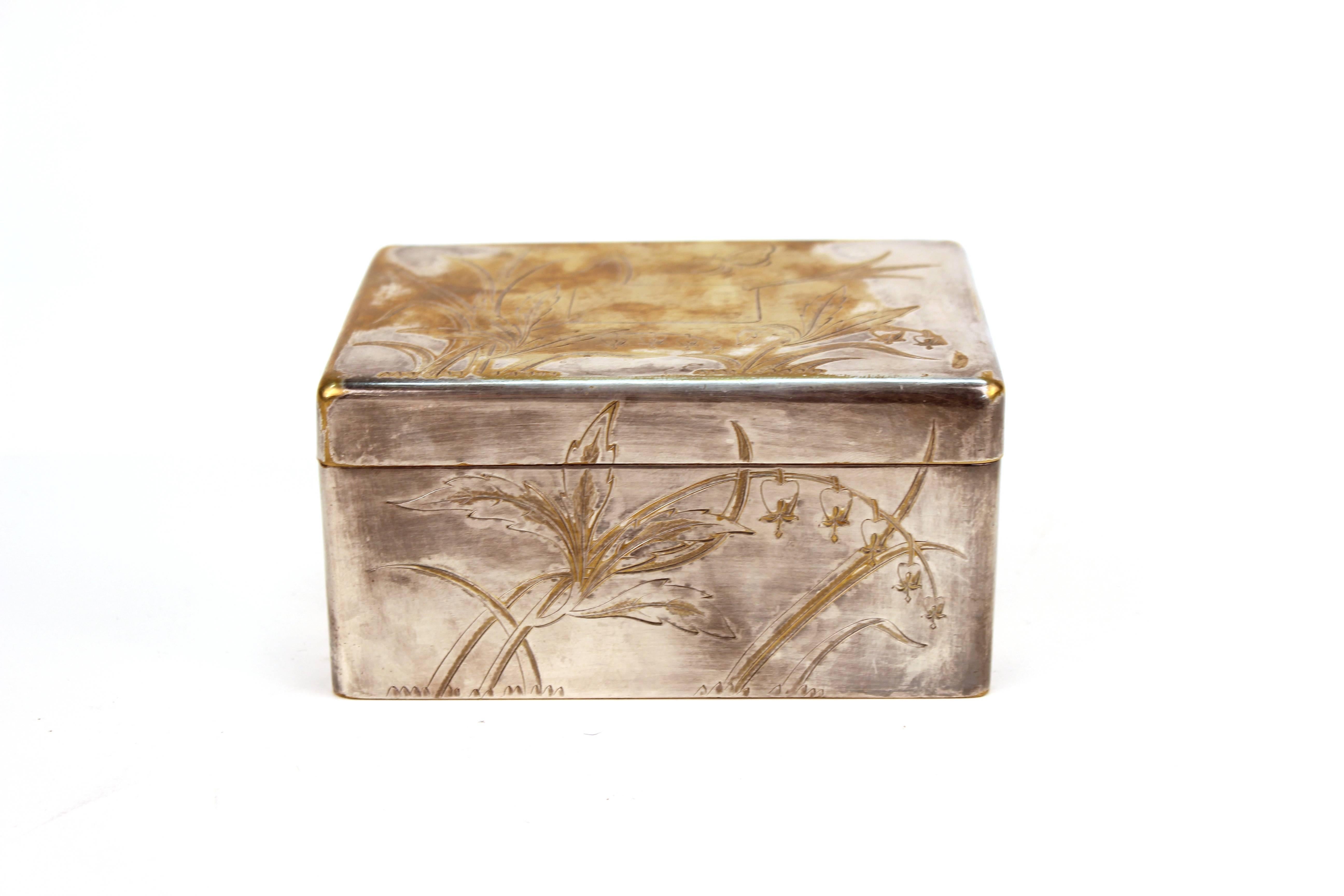 Christofle silver-plated trinket box, incised with decorative leaves and flowers. Makers mark on bottom. In good vintage condition.