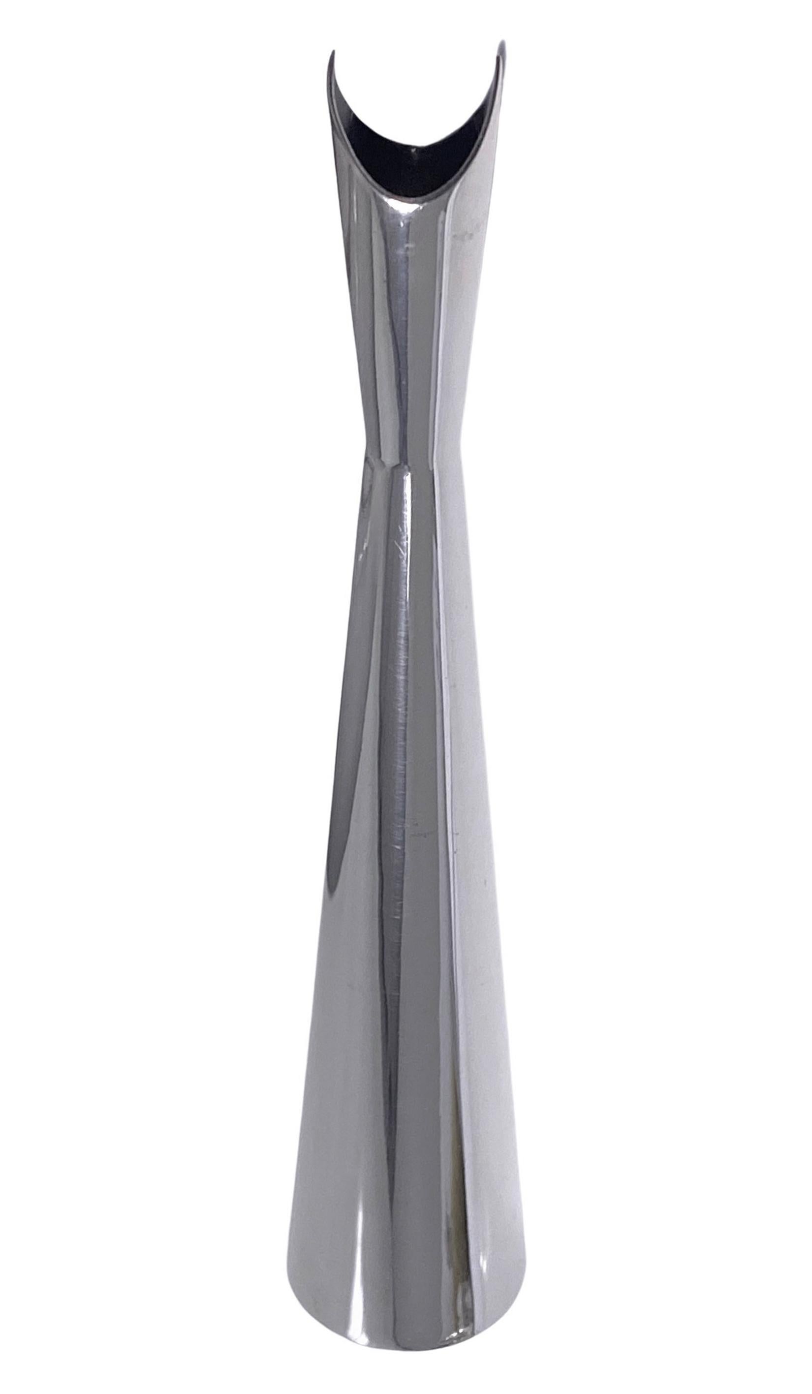 Silvered Metal Vase Lino Sabattini  C.1957. Signed to base with Christofle Coll Gallia mark.Height:8.125 inches. Lino Sabattini became director of design at the prestigious Christofle Orfèvrerie, where he created metal ware notable for abstract