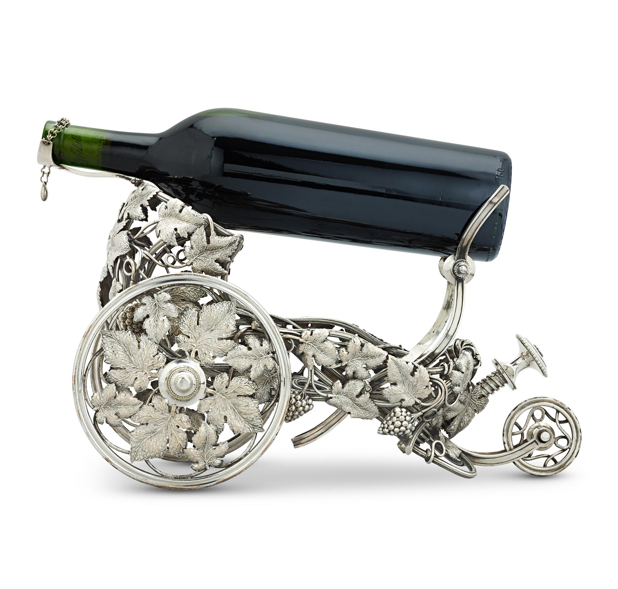 Silverplate Wine Trolley
Christofle
Circa 1873

This magnificent late 19th-century silver-plated wine trolley was expertly crafted by Christofle, the esteemed French firm renowned for their exquisite silver flatware and luxury wares. This