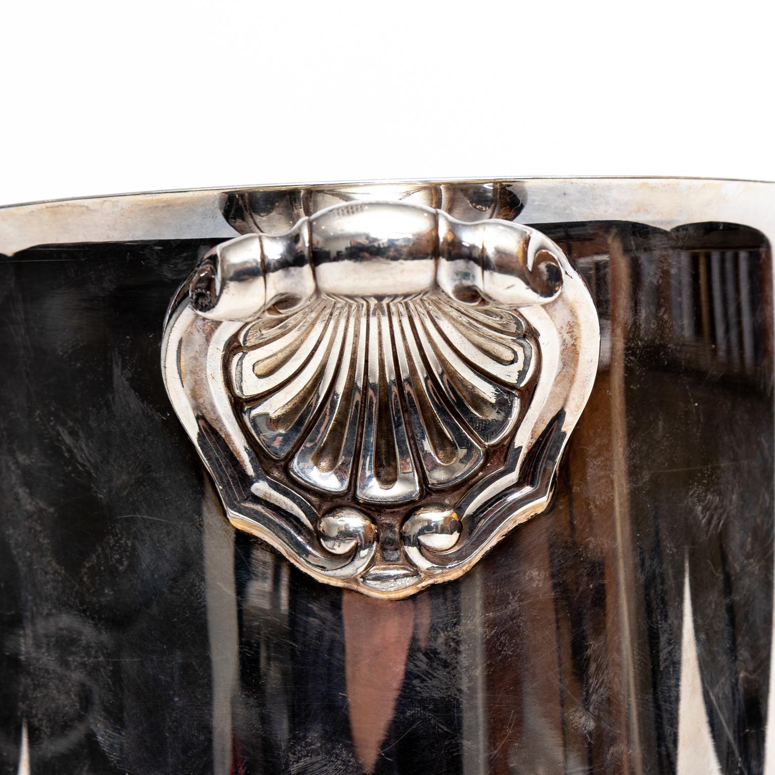 A vintage Christofle silver plate wine cooler/ice bucket. Beautiful lines on a footed base. Pattern is entitled “Ormesson” part of the Gallia collection. Made in France in the 1950s. Please note of wear consistent with age.