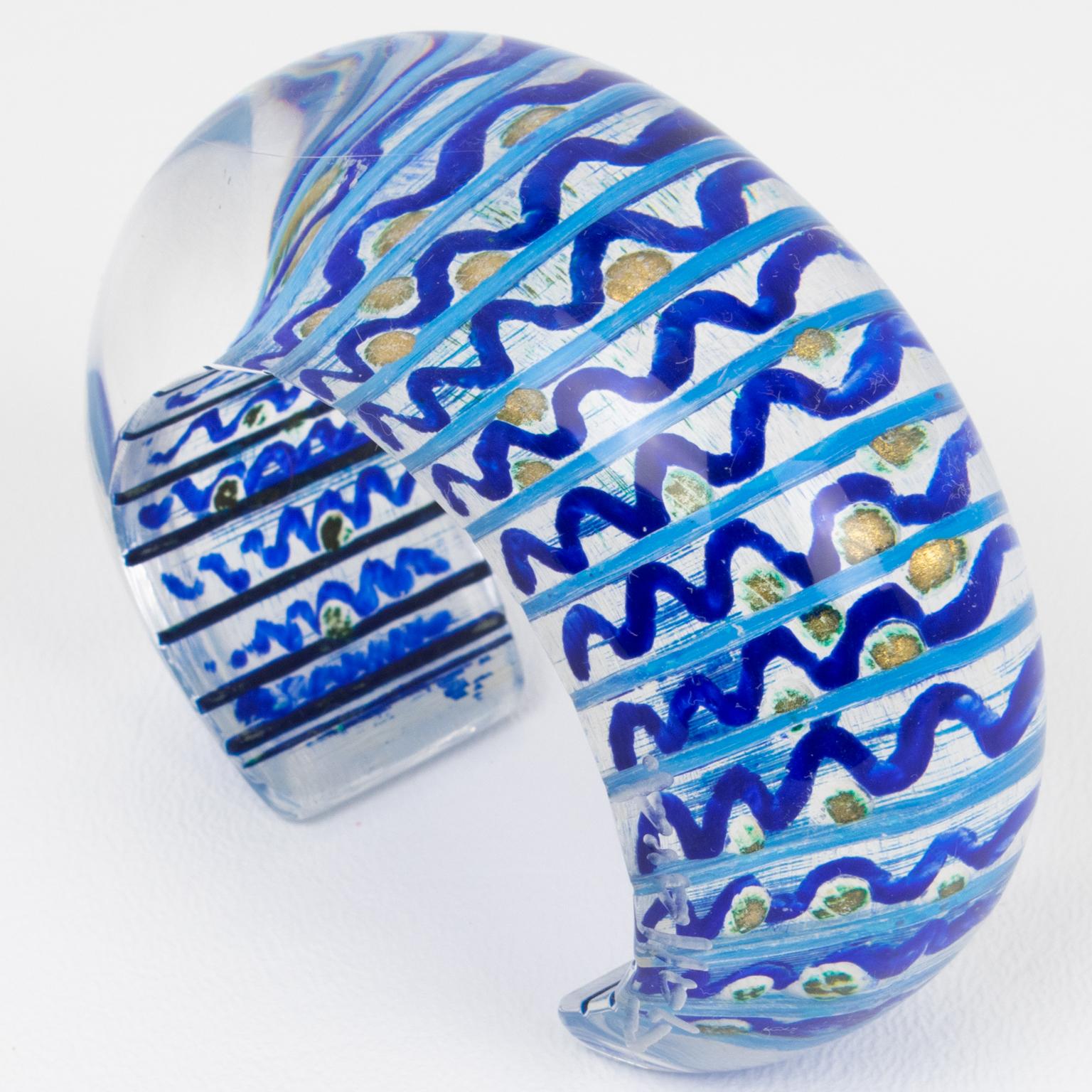 This spectacular Christophe Gallard Lucite cuff bracelet is an incredible piece. This French artist is famous for his sculptures, but his jewelry is equally impressive. The piece features a bold transparent Lucite or Altuglas cuff shape embellished