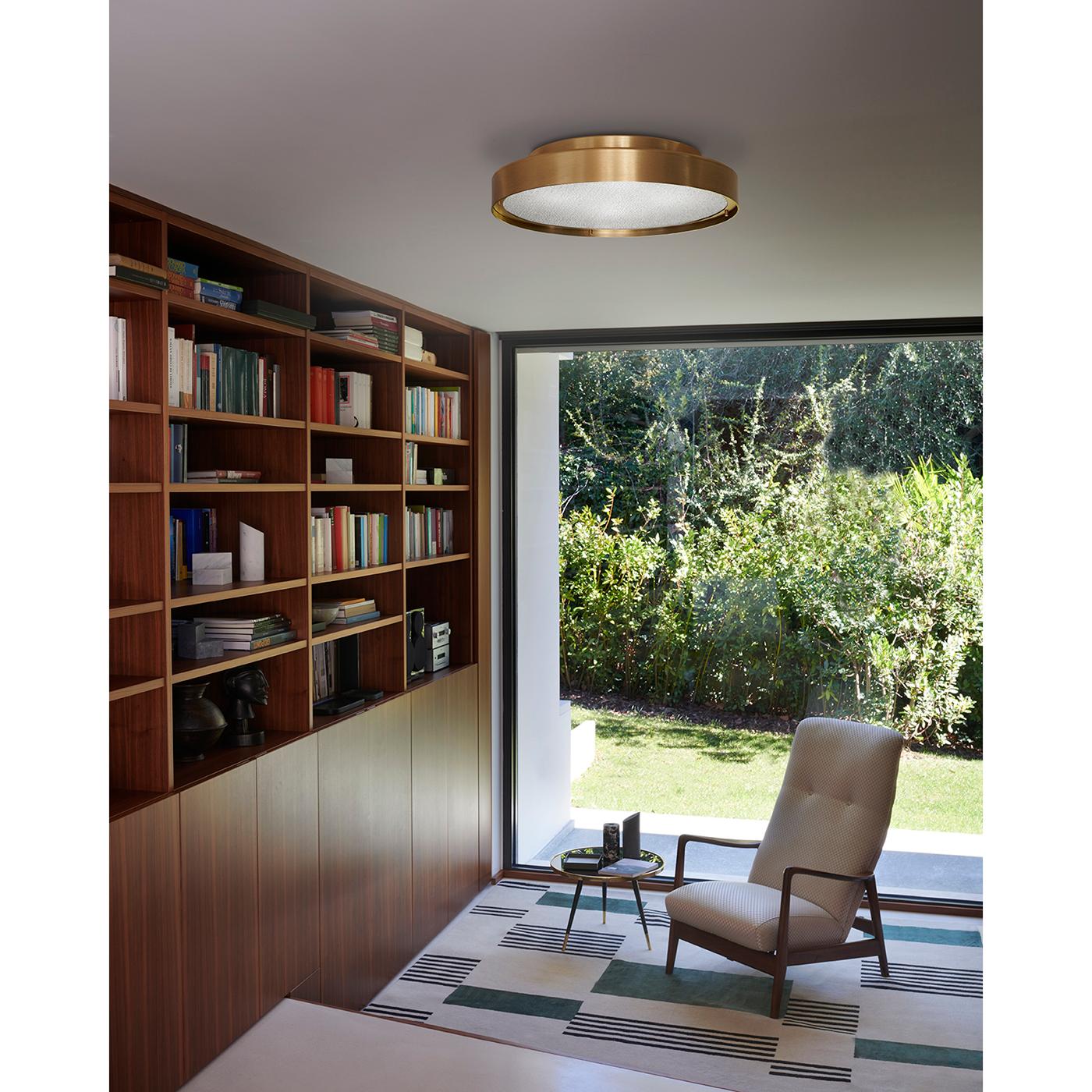 Ceiling and wall lamp 'Berlin' designed by Christophe Pillet in 2017.
Adjustable wall lamp giving indirect led light in metal. Manufactured by Oluce, Italy.

Christophe Pillet designed Berlin, an object that calls into question the common