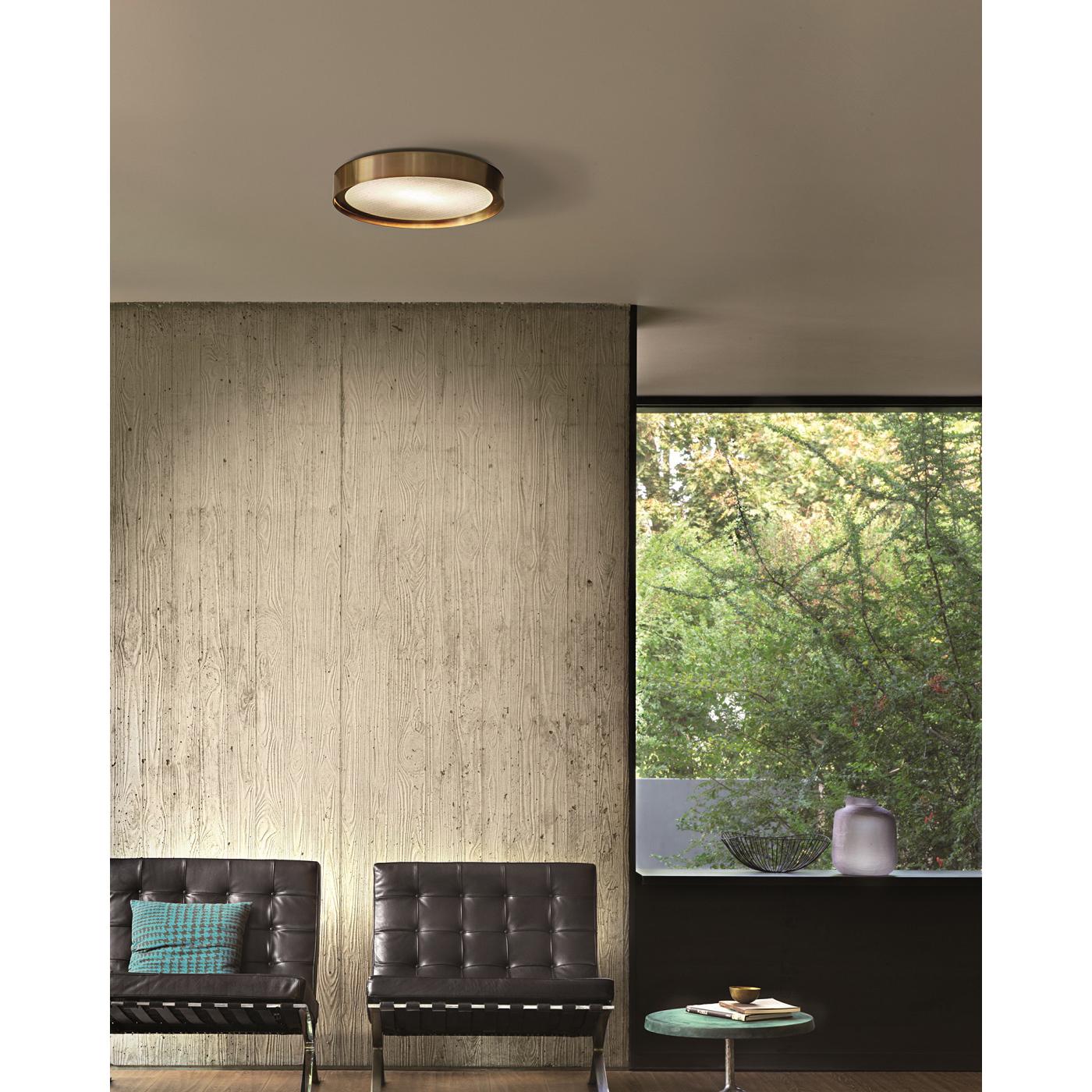 Ceiling and wall lamp 'Berlin' designed by Christophe Pillet in 2017.
Adjustable wall lamp giving indirect led light in metal. Manufactured by Oluce, Italy.

Christophe Pillet designed Berlin, an object that calls into question the common