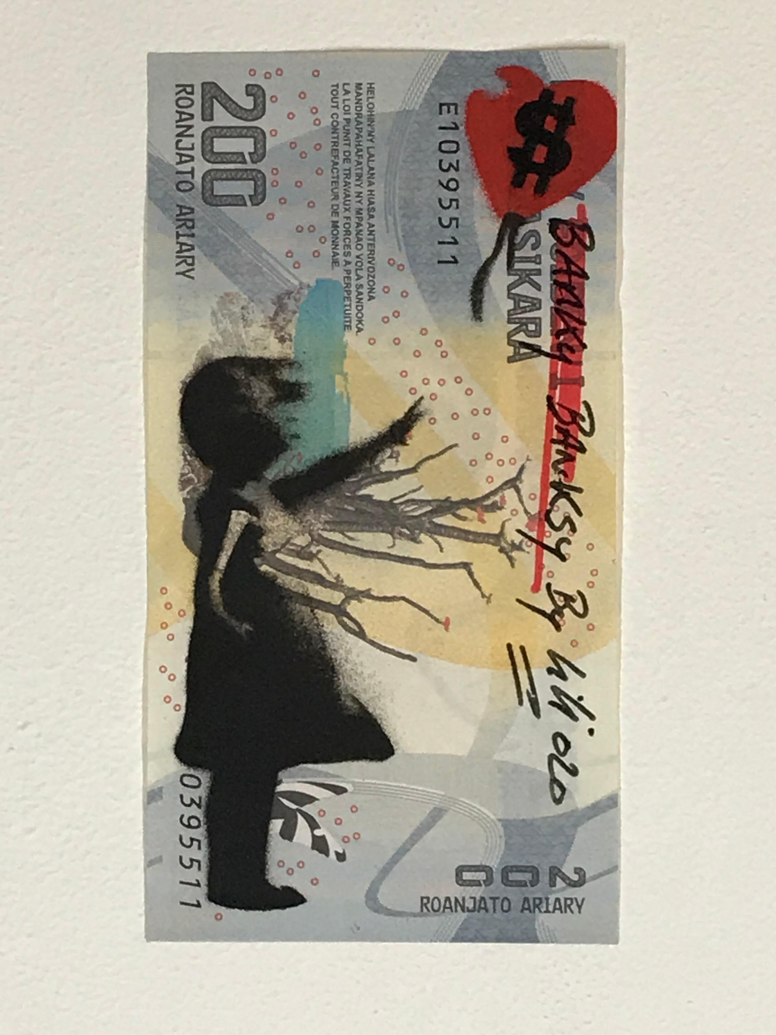 
"Banky-Banksy-by KIKI" gris - 2020
small stencil on Malagasy banknotes - 100 banknote
6 x 11.4 cm (countersigned on the back)