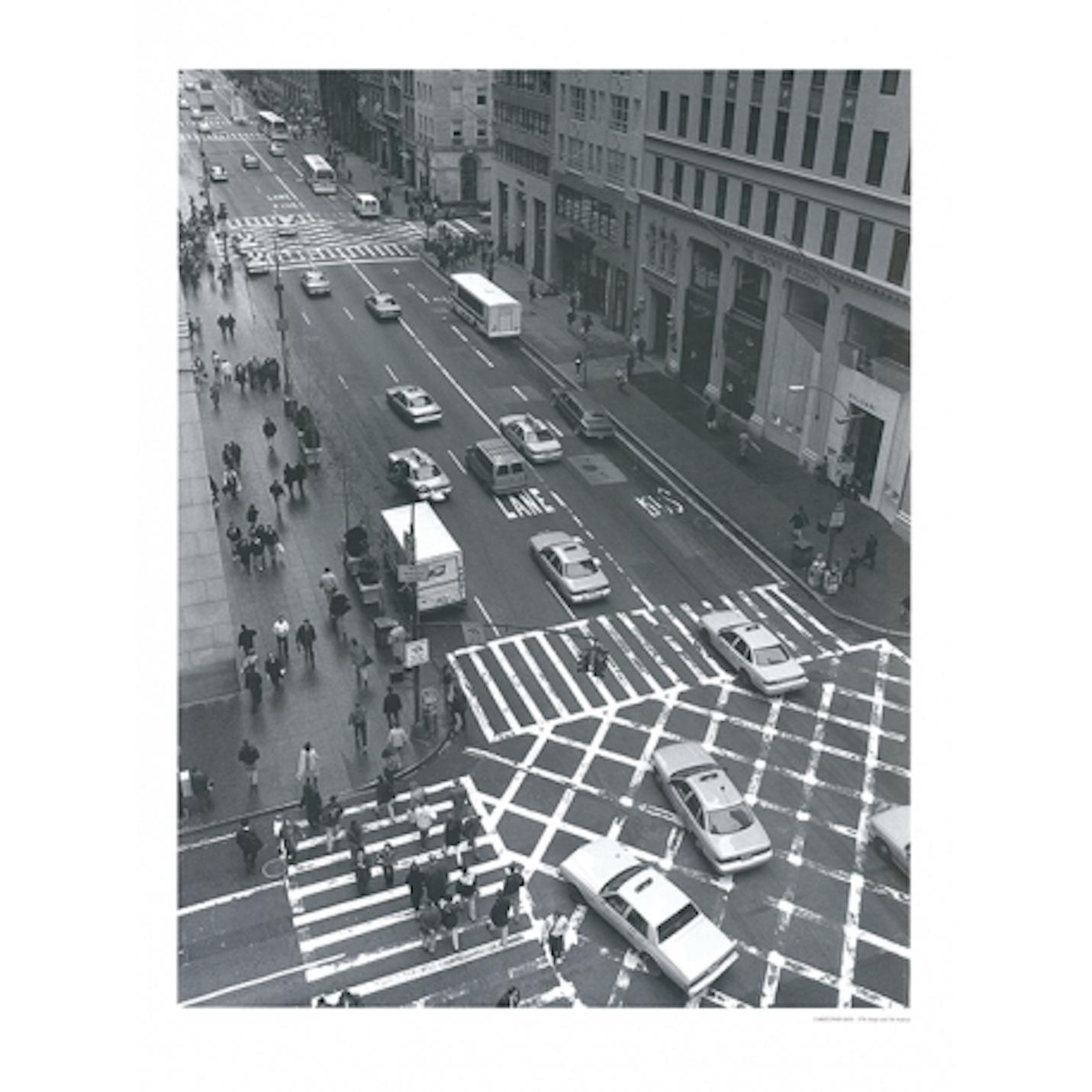 The street crossing of NYC’s 57th Street and 5th Avenue that appears in the greyness of the digital photo shows the dynamics of the movement of people, cars and architecture.
Christopher Bliss is a New York based photographer who has always been