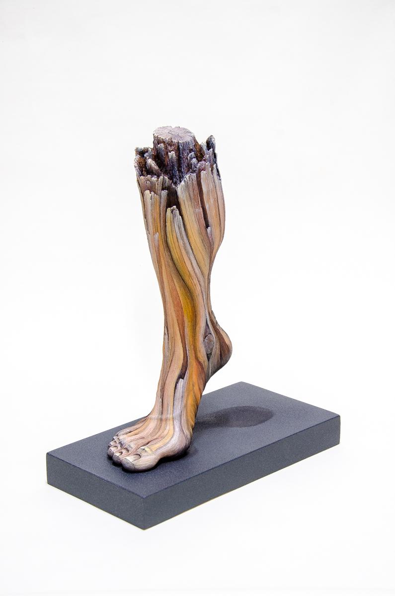 Christopher David White Figurative Sculpture – "Carbon Footprint", Contemporary, Ceramic, Sculpture, Acrylic Paint, Wood Base