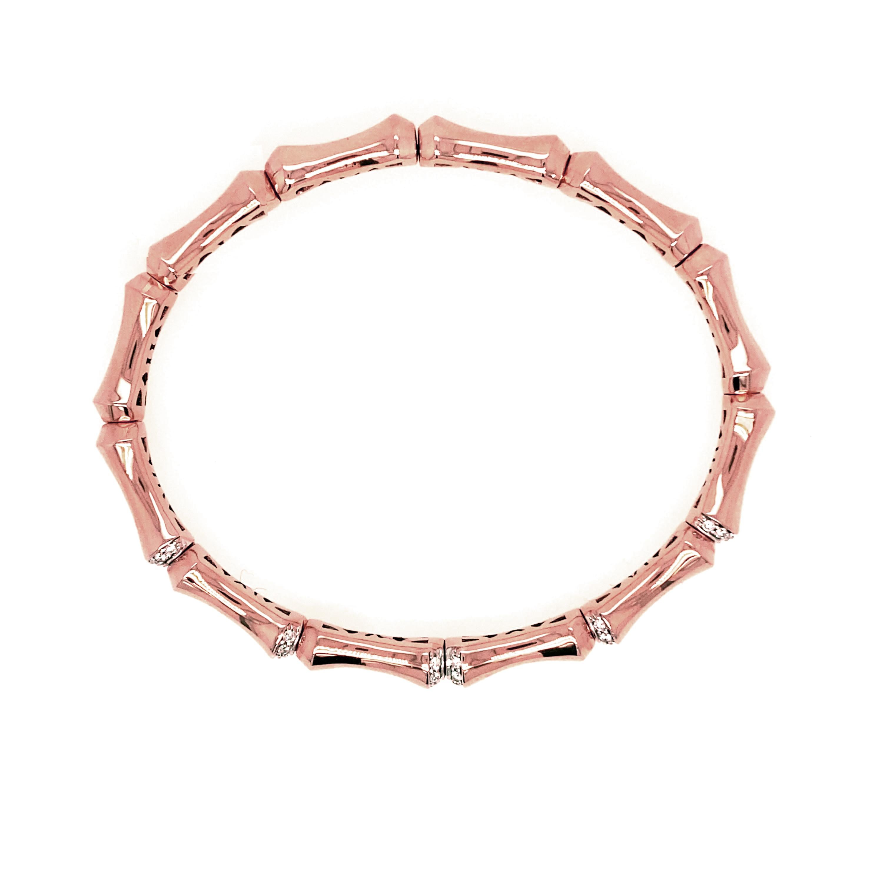 14 karat rose gold memory cuff bracelet with 36 round diamonds 0.28 carat total weight.