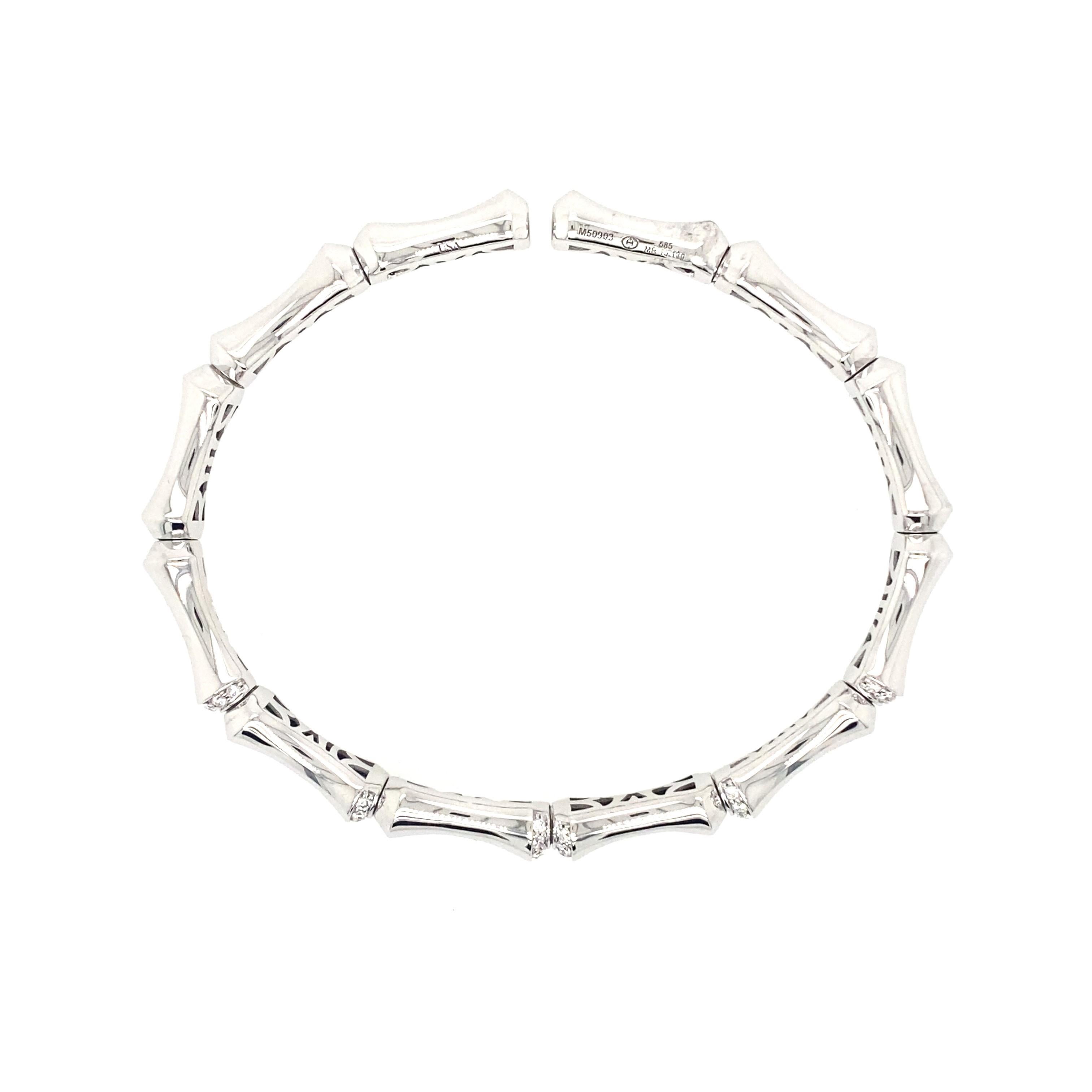 14 karat white gold memory cuff bracelet with five L'amour Crisscut diamonds 0.85 carats total weight.