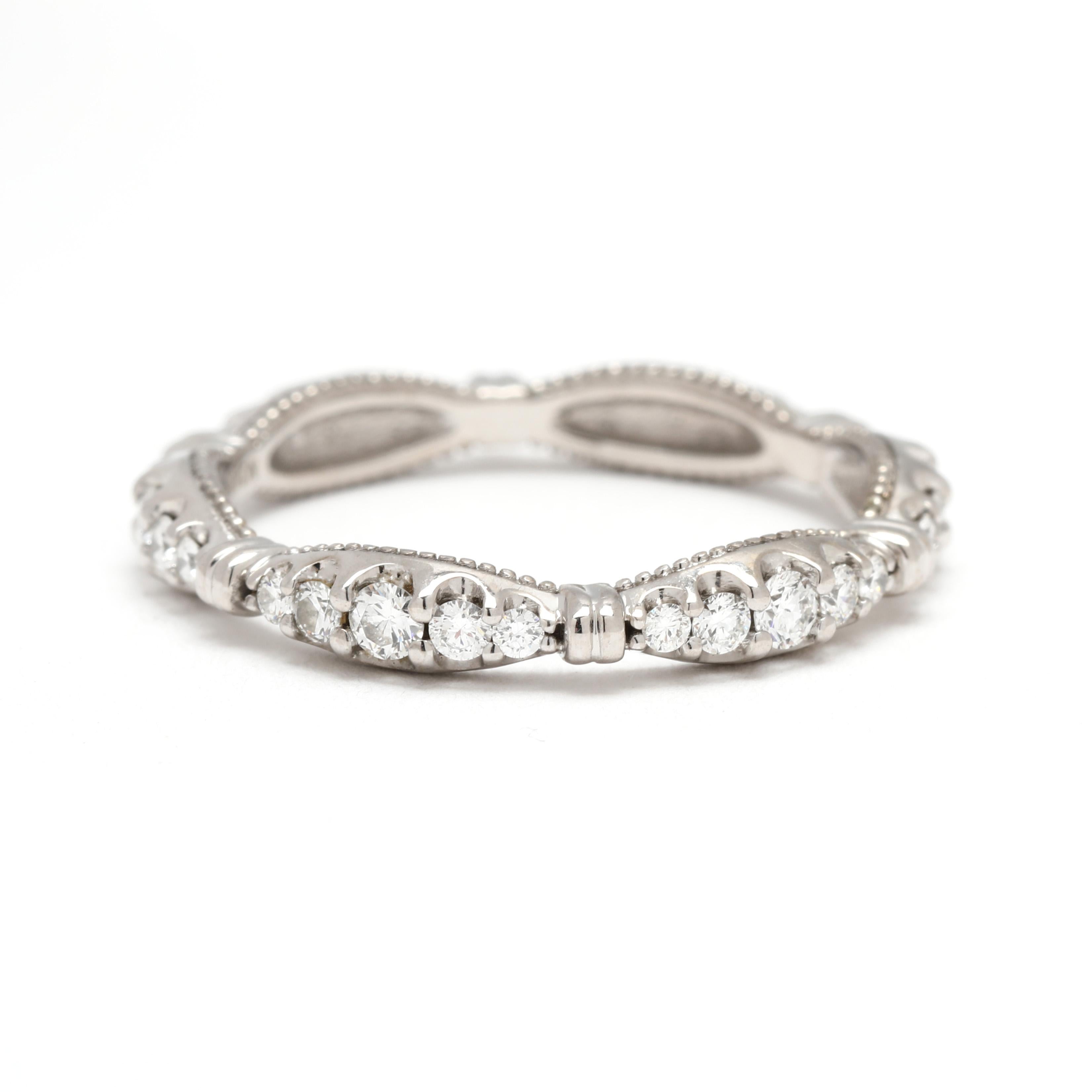 Stones:
diamond
round brilliant cut
1.3 - 2.1 mm
approximately .4 total carats
FG color / VS2-SI1 clarity

Ring Size: 7

Rise Off Of Finger: 2.3 mm

Width: 3.1 mm

Weight: 1.5 dwts. / 2.4 grams

Stamps: 
