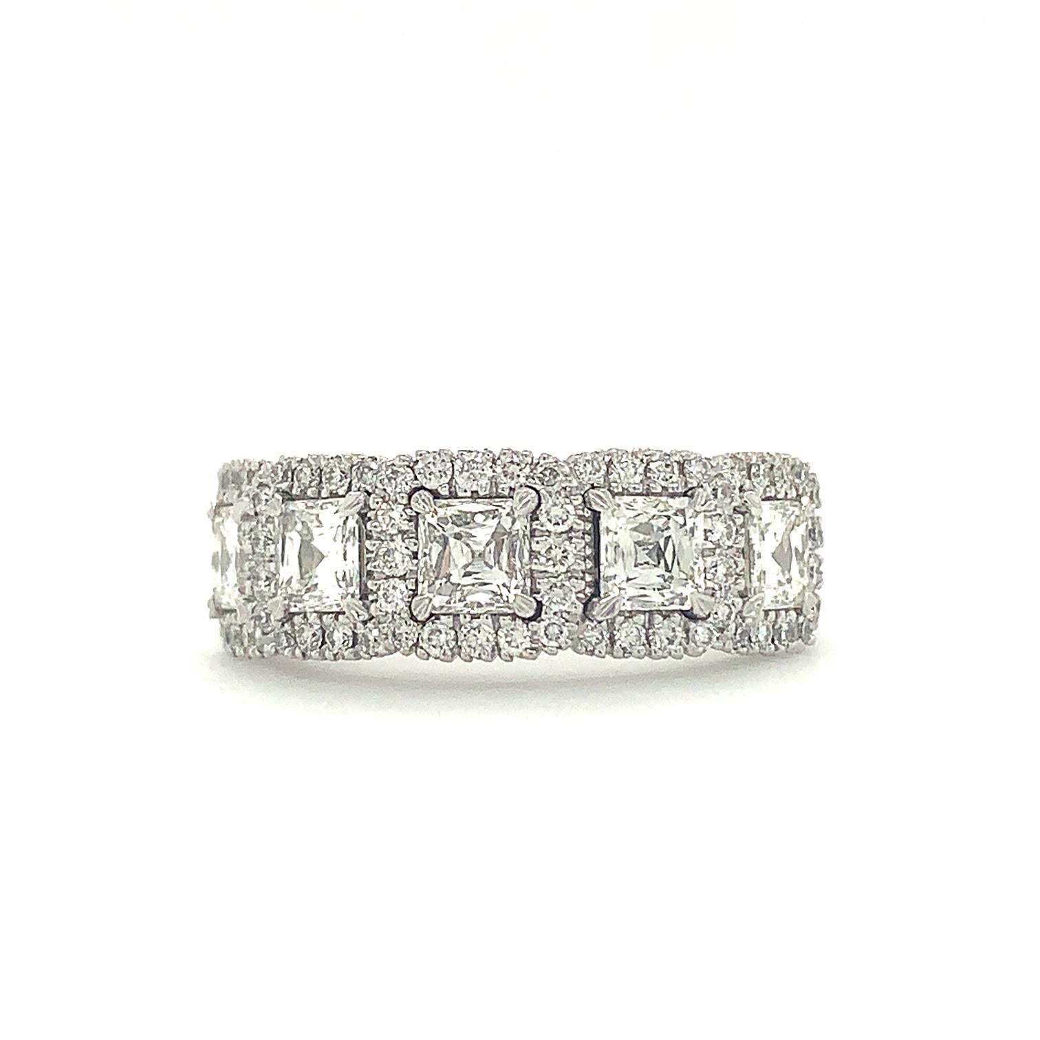 Christopher Designs Crisscut® Asscher Cut 5 Stone Halo Diamond Band  18K White Gold 
5 Asscher cut diamond equal 1.26 ct
Color: H Clarity: SI1
Serial # M26652   
Side Pavé Diamond equals .36 tw. 
Finger Size 6.1/4
6.2 Grams
6.9 mm wide tapering to