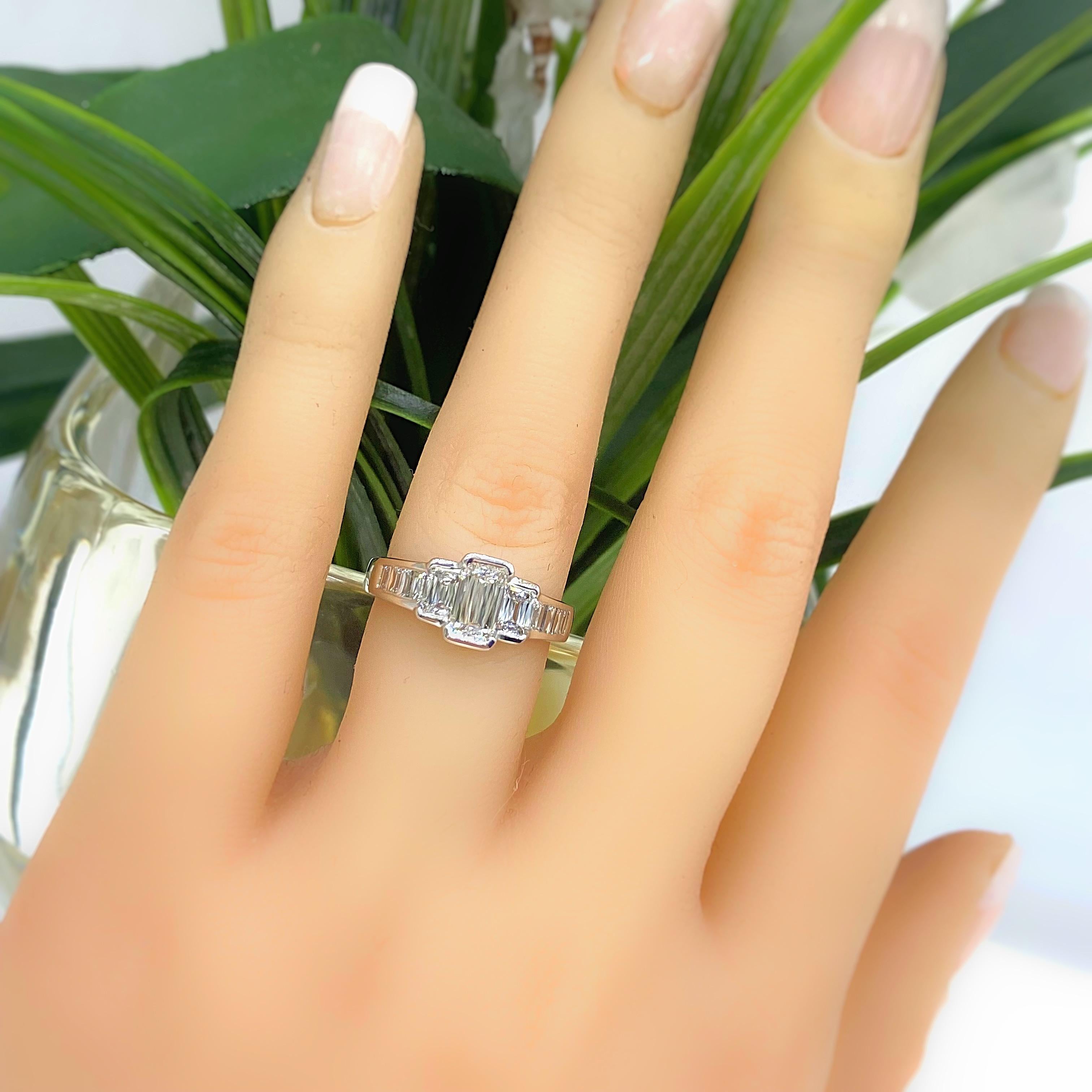Christopher Designs CRISSCUT Diamond L'Amour Engagement Ring
Style:  Bezel Set
Style Number:  L106-100
Metal:  18kt White Gold
Size:  6.25 sizable
TCW:  1.75 tcw
Main Diamond:  Crisscut Diamond ( Emerald Cut ) 0.75 cts
Color & Clarity:  G - H, VS1 -