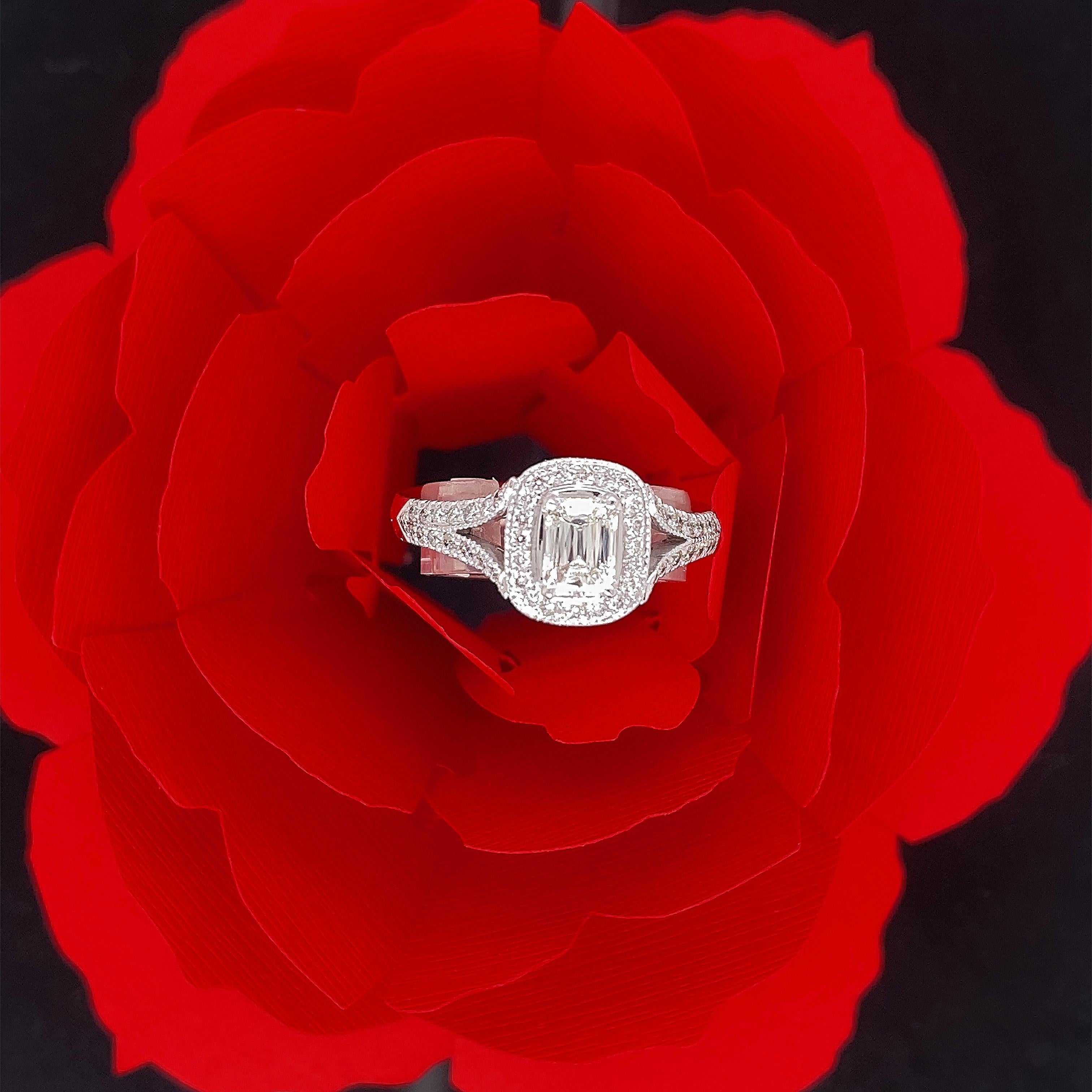 Christopher Designs CRISSCUT Diamond L'Amour Split Shank Halo Engagement Ring
Style:  Halo Split Shank 
Style Number:  L165-085
Metal:  18kt White Gold
Size:  6.5 sizable
TCW:  1.00 tcw
Main Diamond:  Crisscut Diamond ( Emerald Cut ) 0.50 cts
Color