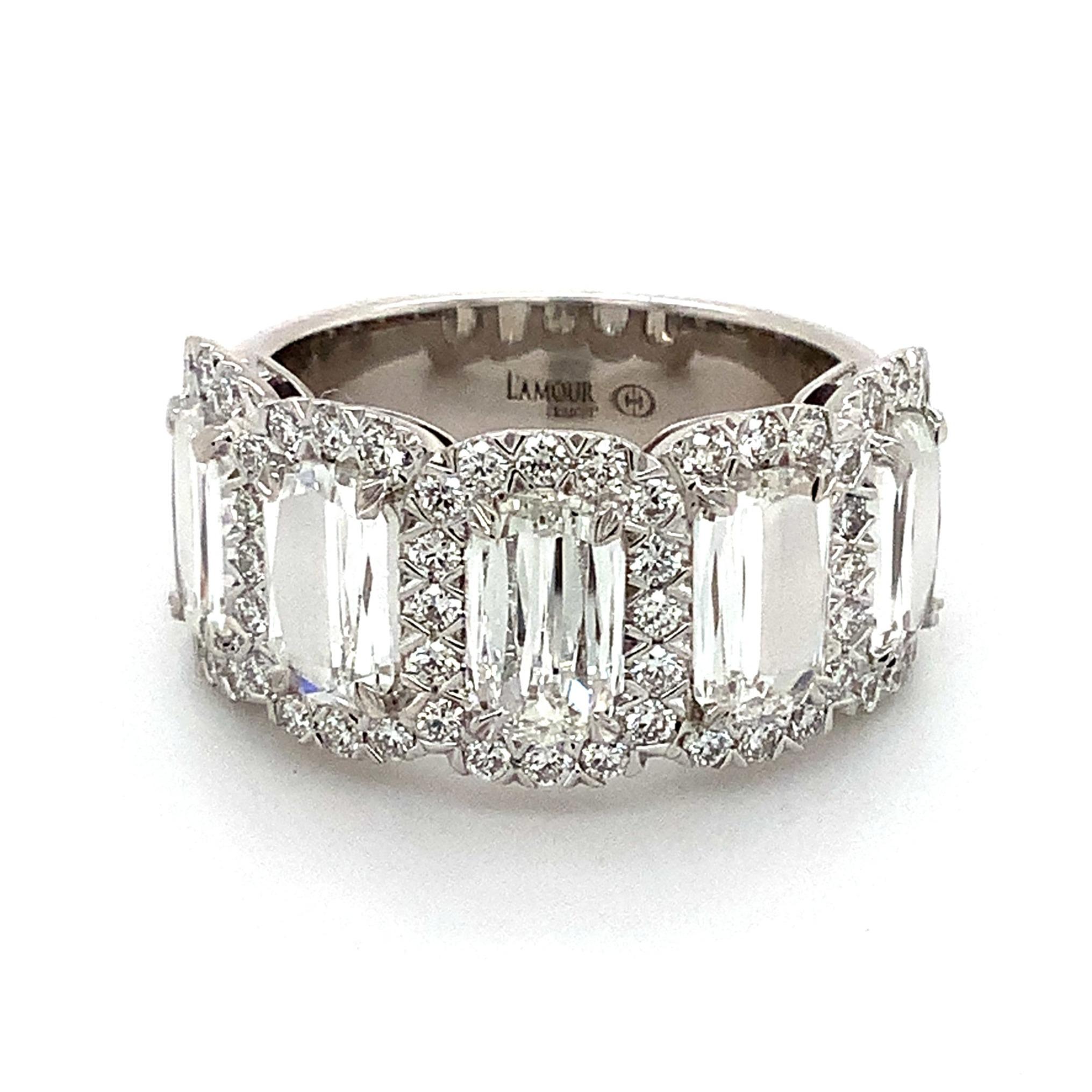This Christopher Designs L'Amour Crisscut® Halo Diamond Ring is crafted with 18k white gold and boasts a total of 3.41 carats of diamonds, including 5 L'Amour Crisscut® diamonds with 2.74 carats t.w.
Center Diamond is Color: E,  Clarity: VS, 
Melee
