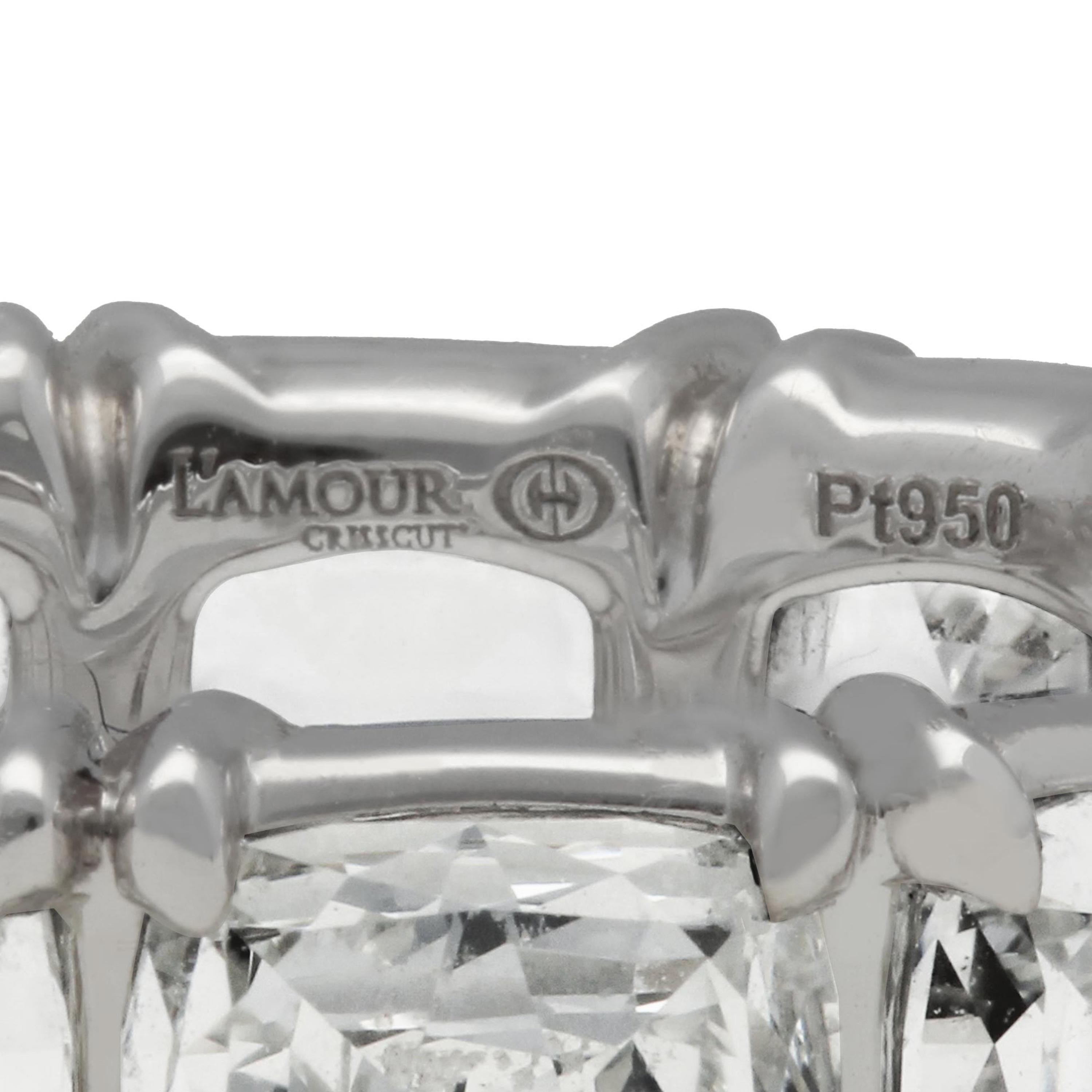 This gorgeous platinum eternity band from Christopher Designs of New York, features their famous craftsmanship and well as a total of thirteen L'amour emerald Crisscut diamonds totaling 5.76 carats, G color, VS clarity size 6.5.
