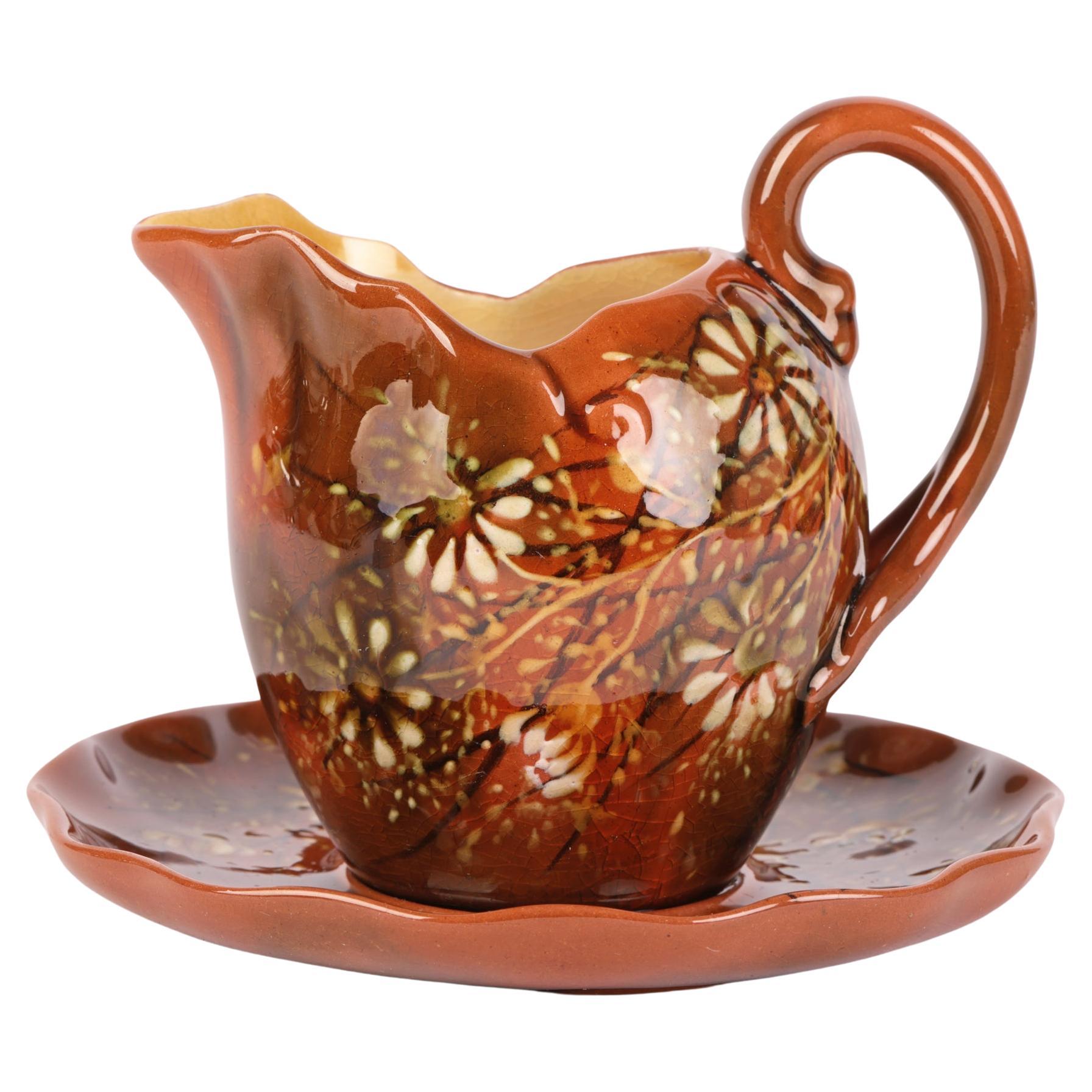 Christopher Dresser Linthorpe Art Pottery Cream Jug & Saucer, c.1880 For Sale