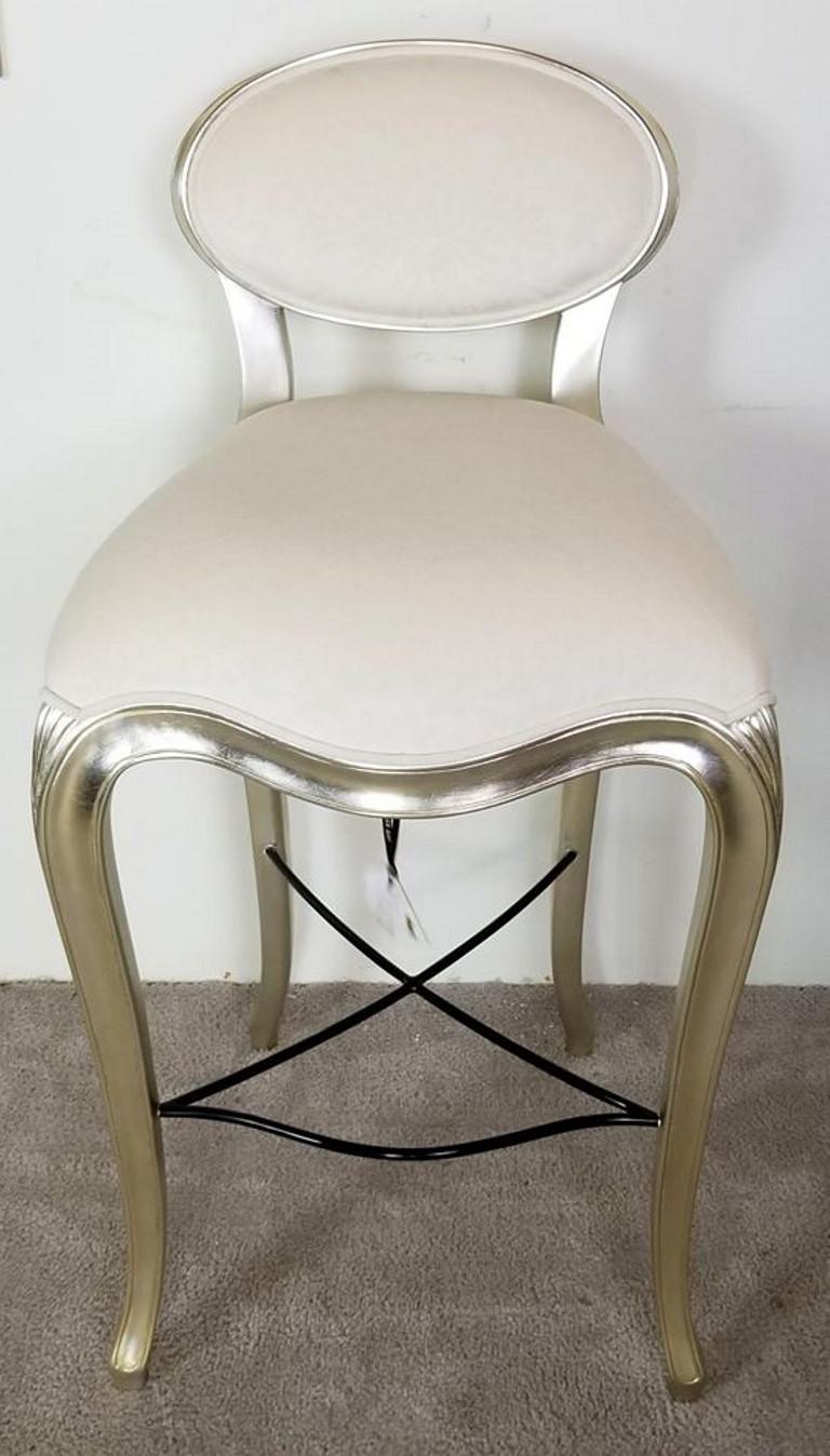 Offeringone of our recent palm beach estate fine furniture acquisitions of A 
Christopher guy cafe de paris bistro stool with a champagne silver leaf finish. 
Current MSRP $4000 (if available).

Approximate Measurements in Inches
42