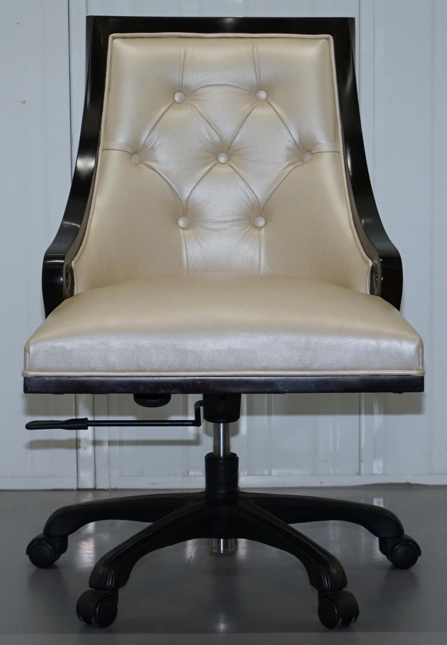 We are delighted to offer for sale this stunning RRP £2430 Christopher Guy Megeve pearl leather height adjustable office chair

A very good looking and piece, it has a lovely pearly finish to the upholstery, the timber has been stained very dark