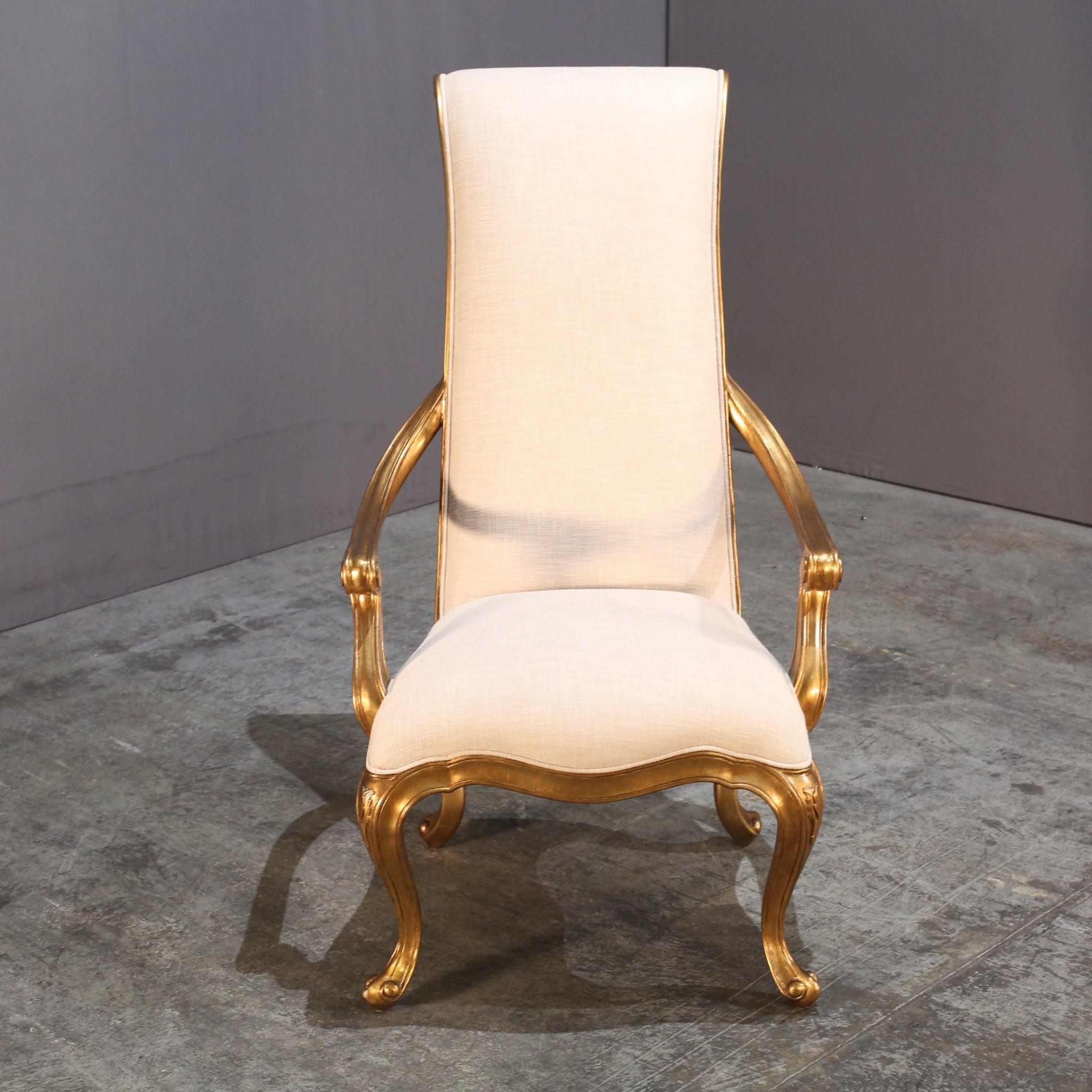 Introducing the epitome of luxury and sophistication - the Tall Armchair by Christopher Guy. This stunning piece is a true masterpiece, crafted with the finest materials and impeccable attention to detail. The tall backrest and elegant curves exude