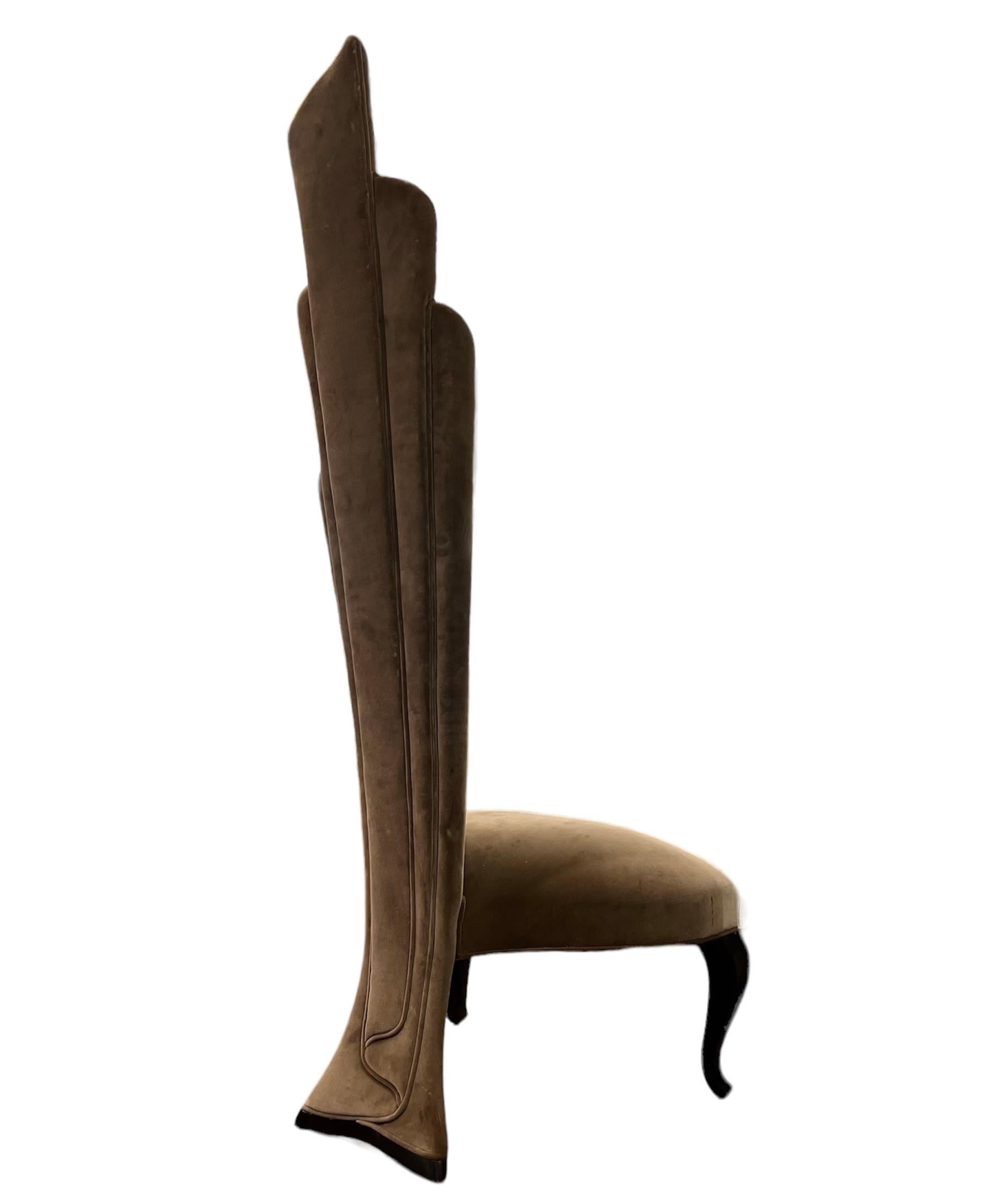 Wrapped in a luxurious Tan Khaki upholstery, the Poiret Torch Chair exudes sophistication and refinement. The neutral hue adds a touch of warmth and versatility, making it the perfect addition to any interior decor scheme. The seat of the chair