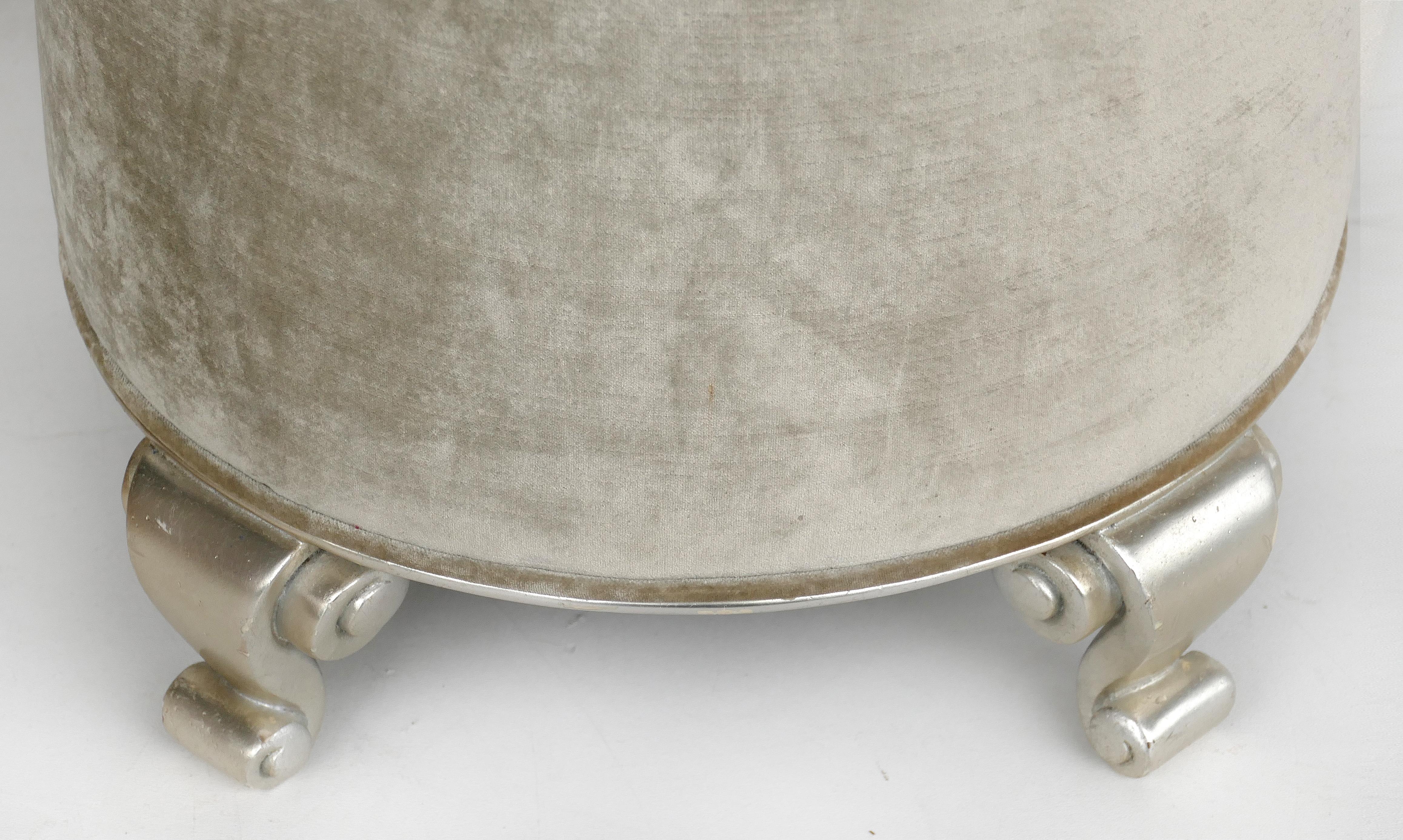 Christopher Guy pouf stool, carved wood and silvered feet

Offered for sale is a round pouf stool that has hand-carved silvered feet by Christopher Guy. Christopher Guy Harrison (1960-) is a British luxury furniture designer who is the founder and