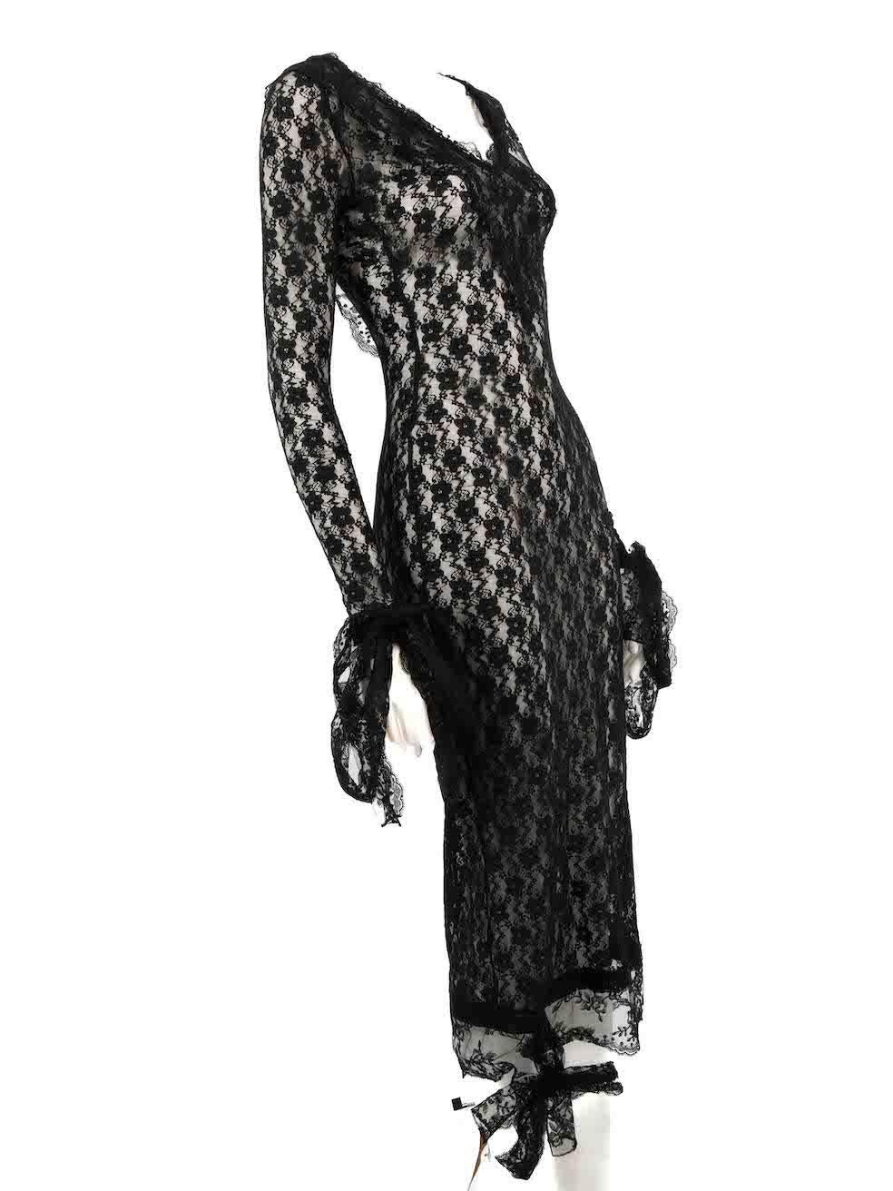 CONDITION is Very good. Hardly any wear to dress is evident on this used Christopher Kane designer resale item.
 
 
 
 Details
 
 
 Black
 
 Lace
 
 Midi dress
 
 Sheer
 
 V neckline
 
 Tie strap detail on cuffs and hem
 
 Back zip closure with hook
